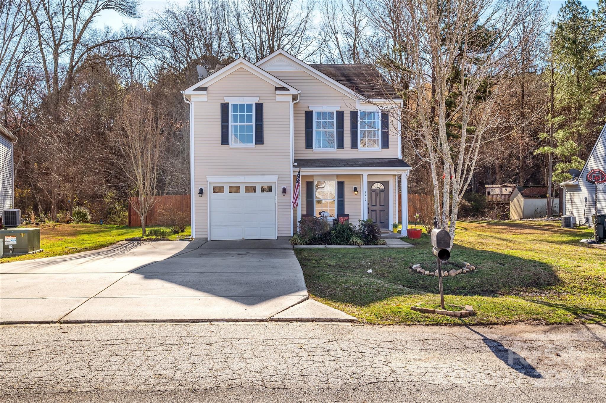 This charming home in York, South Carolina offers 3 bedrooms, 2.5 bathrooms and a fenced in back yard with privacy fencing! Open floor plan down stairs with a large kitchen and walk-in pantry, a new dishwasher was just installed, and fresh paint. The primary bedroom with en-suite is located upstairs with a large walk-in closet. 2 additional bedrooms, a full bathroom, laundry room and loft are also upstairs. Upgraded plumbing throughout entire house. Outside an extended paver patio overlooks the fenced in backyard! This is one of the best lots in Hunter Park, it backs up to privacy trees  and a small creek in the back!