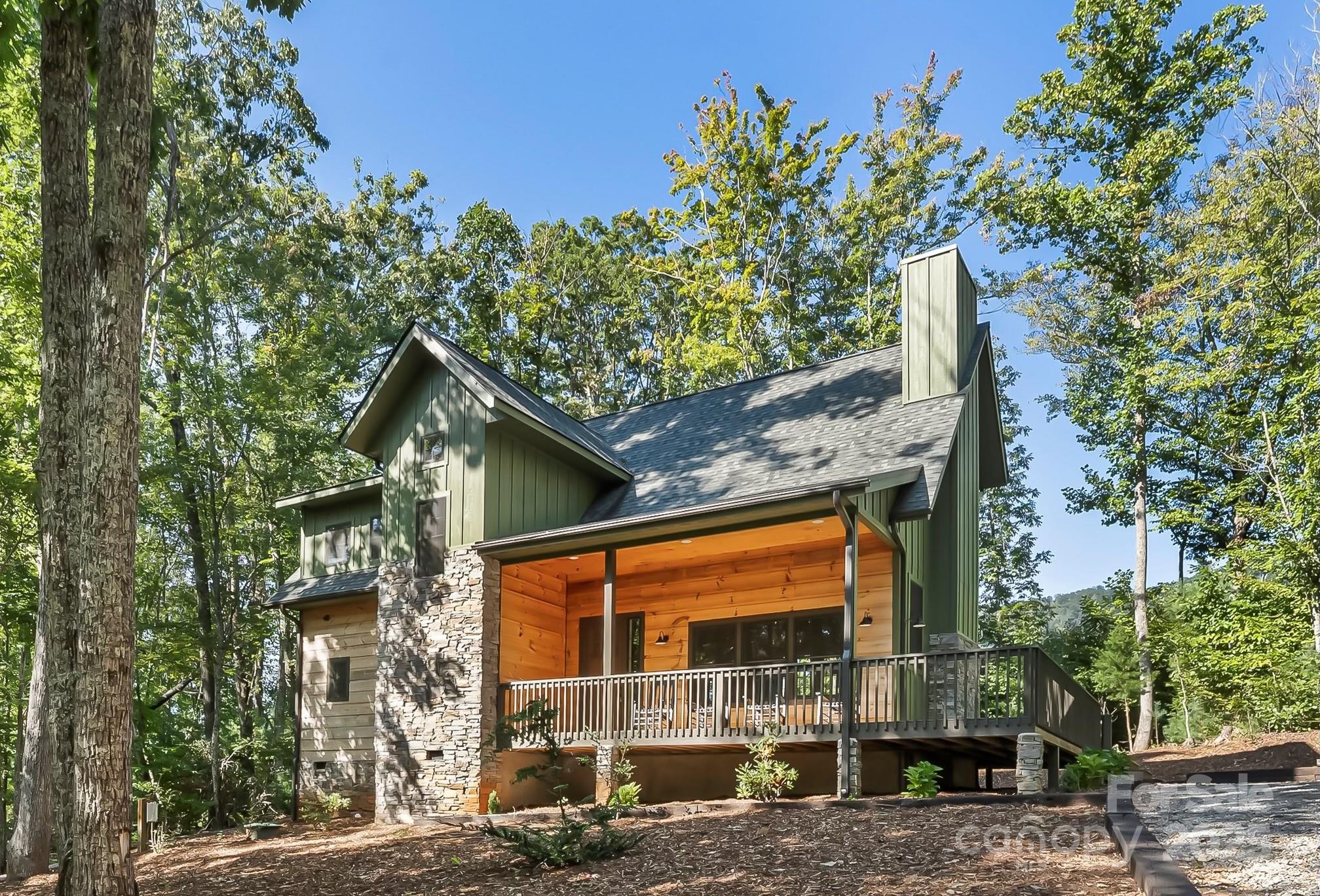 Welcome to Linville Falls Mountain Club! This beautiful mountain retreat at 90 Clinchfield Gap Rd. offers the perfect balance of comfort, style, and location. Nestled perfectly just minutes from Linville Falls, Linville Caverns, the Blue Ridge Parkway, and all the best mountain attractions, this home is an ideal getaway or full-time residence.
The thoughtfully designed home features an inviting open floor plan with a spacious great room, modern kitchen, and abundant natural light. Relax on the covered porch and take in the crisp mountain air, or explore the community’s amenities, including the North Cove Leisure Club Disc Golf Course, scenic walking trails, and outdoor gathering areas.
Conveniently located between Marion and Banner Elk/Boone, you’ll have easy access to hiking, waterfalls, skiing, fishing, and Lake James recreation. Whether you’re looking for a serene mountain escape or a home base for outdoor adventure, this property is the perfect fit.