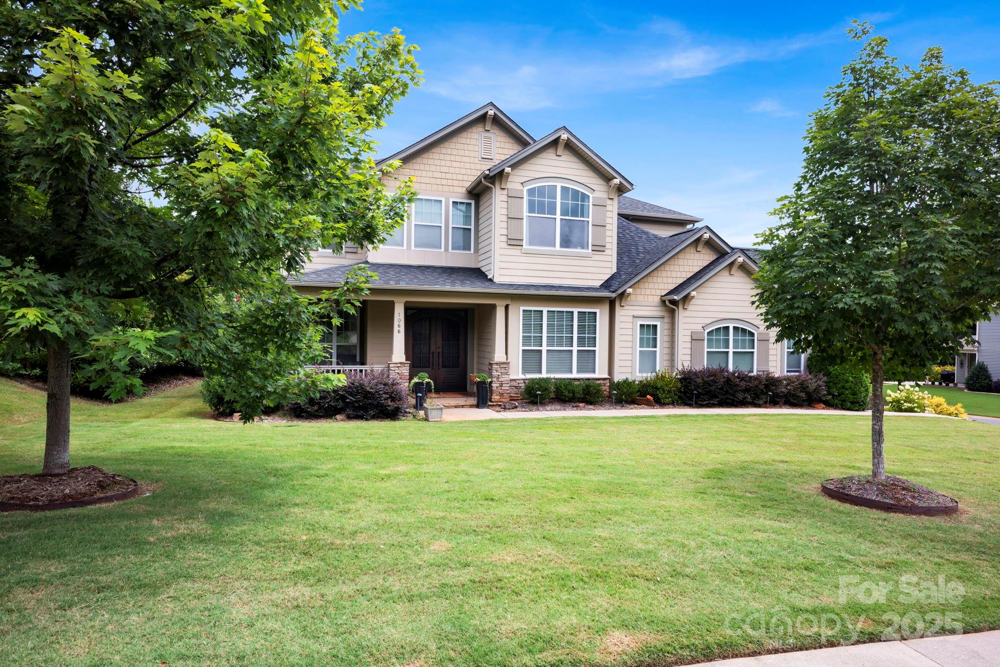 Prepare to be impressed with this highly upgraded, move-in ready home in popular Shelly Woods! This home offers a true chef's kitchen with massive island, quartz counters (2021), double wall ovens, gas cooktop and updated backsplash. Flooring replaced with engineered wood on all of the main level. Upstairs loft & primary bedroom received new LVP in 2021. Two story great room featuring built-in storage, custom wall trim, and electronic shades in upper and lower windows. Functional rooms including the main level sunroom with built in storage is perfect for crafting or a home office while the upstairs loft provides a perfect place to watch the game. Outside you will find a large patio, fully fenced yard, irrigation, landscape lighting, water fountain and mature landscaping providing a private oasis. Note the high end custom front doors with glass frames that can open to allow for natural breeze to filter through the screened openings. The 3 car garage has a TON of custom storage shelving.