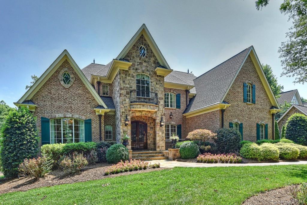 Unique views of Springfield Golf Course. This incredible estate backs directly onto the green. Seven bedrooms, 6.5 bathrooms, hardwood floors, vaulted ceilings, stainless steel appliances, huge central island, walk-in closets, a finished basement suite, a stunning brick balcony and patio as well as an outdoor fireplace and swimming pool are just a few of the decadent touches this home has to offer! Three levels of outdoor living areas accent this stone and brick home. Lots of storage.
