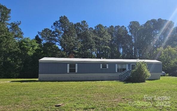 Welcome Home...2 bed 2 bath single wide in Rock Hill. Country like setting. Off street parking. Open living room. Eat in kitchen w/ washer and dryer hook ups. Split bedroom floor plan. New flooring. Tenant to care for lawn and trash removal. Pet conditional with owner approval. Renters Ins required. No interior smoking/vaping. Avail Now!!! 
App fee is $75 per person over age 18 nonrefundable.
One time admin fee of $150 due at move in.
Must have credit score over 600
No evictions or owing money to landlords
Must make 2.5x rent in income