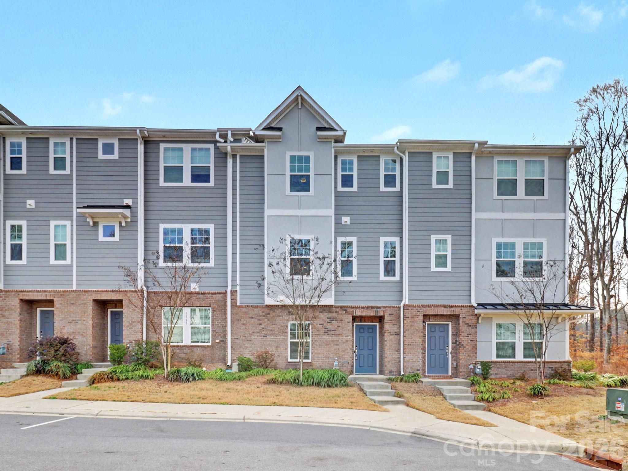 Move-in ready and energy-efficient, this exceptionally maintained 4-bedroom, 3.5-bath townhome offers modern design, flexible living space, and a prime location in the Enclave at City Park community. This home delivers the appeal of new construction without the wait. The main living level features an open, airy layout enhanced with LVP flooring and abundant natural light. The chef-inspired kitchen is designed for both function and style, showcasing a generous island, large pantry, stainless steel appliances including a gas range. The adjacent living and dining areas flow effortlessly, creating an ideal setting for daily living and entertaining. Step outside to the private balcony — a perfect space to unwind or enjoy a good book.

A private bedroom/office with full en-suite bath on the entry level provides excellent versatility for guests, remote work, or multigenerational living. Upstairs on the third floor, the spacious primary suite and additional bedrooms offer comfort, privacy, and beautifully finished bathrooms.

Additional highlights include a rear facing two-car garage, plentiful guest parking, and drop zone.

This home offers exceptional convenience just minutes from Charlotte Douglas International Airport,  South End (LoSo), Charlotte Regional Farmers Market, LYNX Light Rail, Renaissance Park and easy access to both outdoor recreation and vibrant city life. A rare opportunity to own a nearly new townhome in one of Charlotte’s most convenient and connected locations.