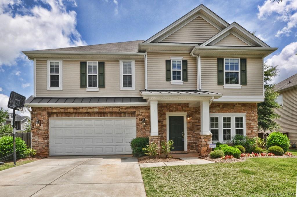 Large family home featuring upgraded kitchen with stainless steel appliances, granite, double ovens, and tile backsplash.  Refrigerator stays.  Kitchen opens to breakfast area and expansive morning room featuring stone surround gas fireplace.  Bedroom and full bath on main level! Upstairs offers great loft space with wood floors and 3 additional bedrooms.  Master with trey ceiling and upgraded master bath. Large closets.  Entire home has been freshly painted!  Fenced backyard.  Great location!