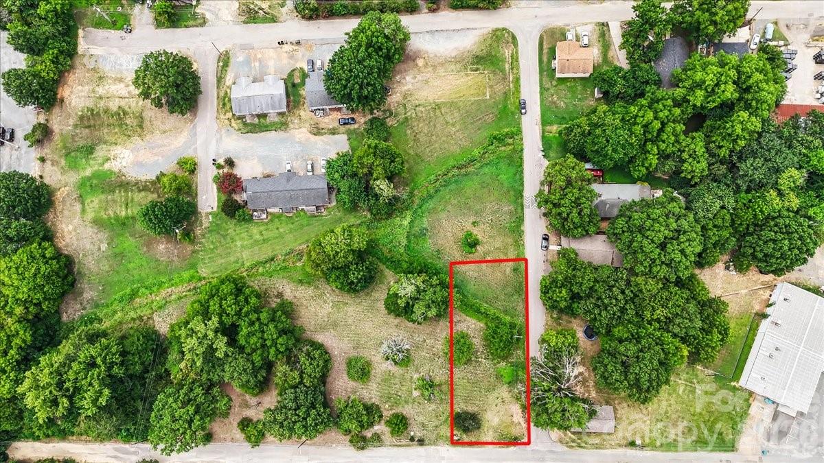 Discover the potential of this 0.16-acre lot located in Monroe's Concord Avenue Overlay District. The current zoning allows for duplexes, townhomes, multifamily residential, and approved commercial uses. (Please see the attached Concord Avenue Overlay (CA-O) UDO in the listing documents for details on the property's permitted uses) Whether you're looking to develop an income-producing residential property or bring your dream startup business to life, this property is well-positioned in an established area just minutes from Downtown Monroe, the W. Roosevelt Blvd commercial corridor, shopping, dining, and major roadways. Buyer to verify all intended uses with the City of Monroe.

Tap fee is required for both water and sewer.