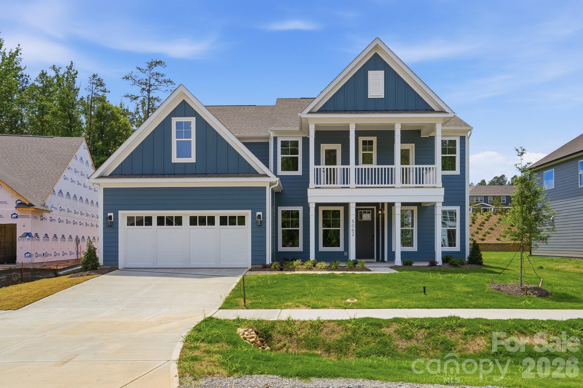 This beautiful, 2-story Charleston plan offers almost 3,800 square feet of living space with 5 bedrooms and 4 full baths. The main floor includes a guest bedroom & full bath with 4-ft shower, a large kitchen with white cabinets and a contrasting gray island, butler pantry with a wine fridge, family room with a Cosmo gas fireplace & shiplap accent wall, a dining room with tray ceiling, and an office with a faux coffered ceiling. The kitchen also features a farmhouse sink, a stainless range hood, and stainless appliances, including a gas cooktop. The second floor includes a large bonus room with two closets, the primary suite with a luxury shower, 3 secondary bedrooms, a hall bath, and a Jack-n-Jill bath. Enjoy the outdoors on the front porch, upper balcony or rear screened porch. Other wonderful upgrades include a foyer with tray ceiling, beadboard drop zone in the mud room, laundry room with cabinets, tankless water heater, and stairs with composite treads & metal balusters. Visit today and find out more!