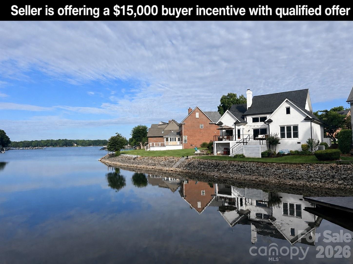 *$15,000 BUYER INCENTIVE WITH QUALIFYING OFFER! 
Exceptional waterfront gem in Cornelius under $2.2M. This well-maintained and recently updated home features 5BD/5BA providing the ultimate blend of luxury, convenience, and lake charm.  Conveniently located to nearby Birkdale dining and shopping, downtown Charlotte and the airport. Step inside the dramatic two-story great room complemented by a floor to ceiling book-matched porcelain fireplace, where windows fill the freshly 
painted home with abundant natural light.  Relax in your 4-season sunroom while taking in unobstructed captivating lake vistas and sunsets. Designed for effortless lake living and entertaining, the beautifully updated gourmet kitchen shines with quartz countertops and large center island, sleek custom cabinetry, ILVE professional gas range, stainless appliances, lighted wine wall, coffee and beverage bar, perfect for cooking and entertaining. Desirable primary suite on the main level offers convenience and accessibility, 
with an expansive walk-in closet with center island.  An additional main level bedroom provides flexibility for a home office, guest room or study. The open-concept living of this waterfront home seamlessly connects to 
outdoor living space for relaxing and entertaining on its expansive deck, paver patio with a built-in fire pit, or a covered lower patio embodying serene lakefront elegance. Complete with a deeded boat slip just steps away, providing effortless access to water recreation, nearby to a community pool, tennis and pickleball court. 
Don’t miss this rare opportunity to own a waterfront paradise in one of Cornelius’ most sought-after lakefront locations.