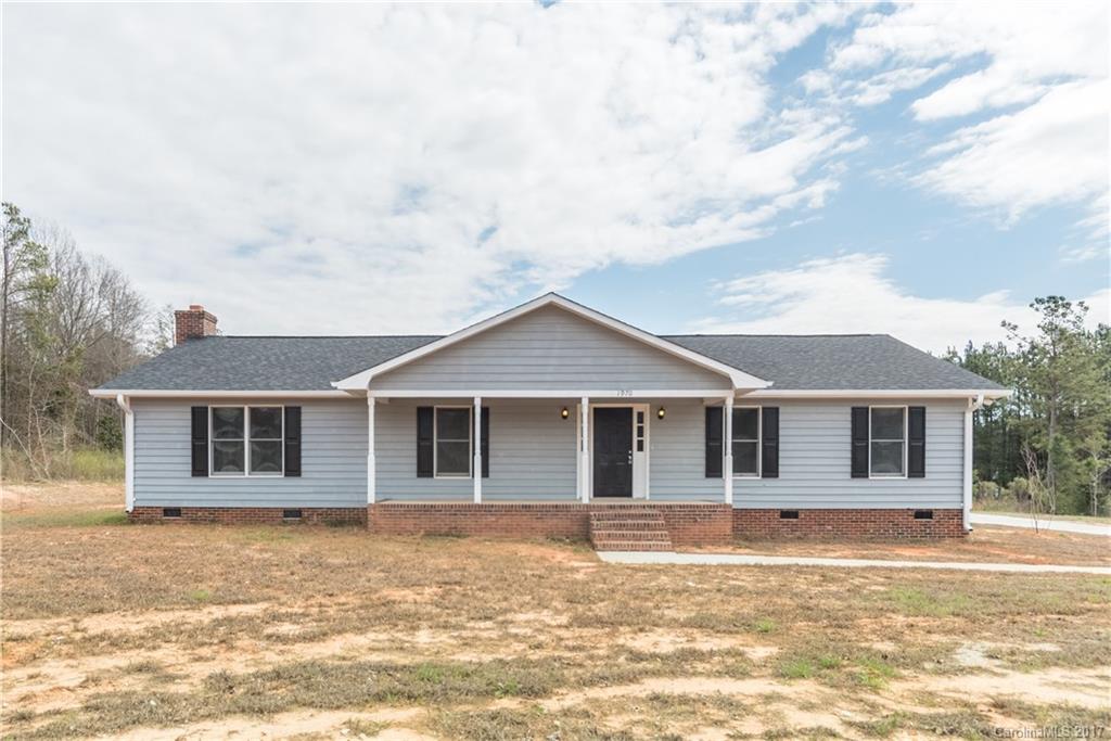 So you've been looking for that great ranch with plenty of land and updates..... Well look no further! This 3bed/2full bath Ranch rest on 2.45 acres and is just a short drive to the gorgeous shores of Lake Wylie, SC! At 1875sqft with its large great room including masonry fireplace this home is sure to please! Granite counter-tops, double ovens and gas cook-top! New laminate wood floors, and carpet! New roof in 2016! Beautiful back deck with gas hookup! Two car attached garage!