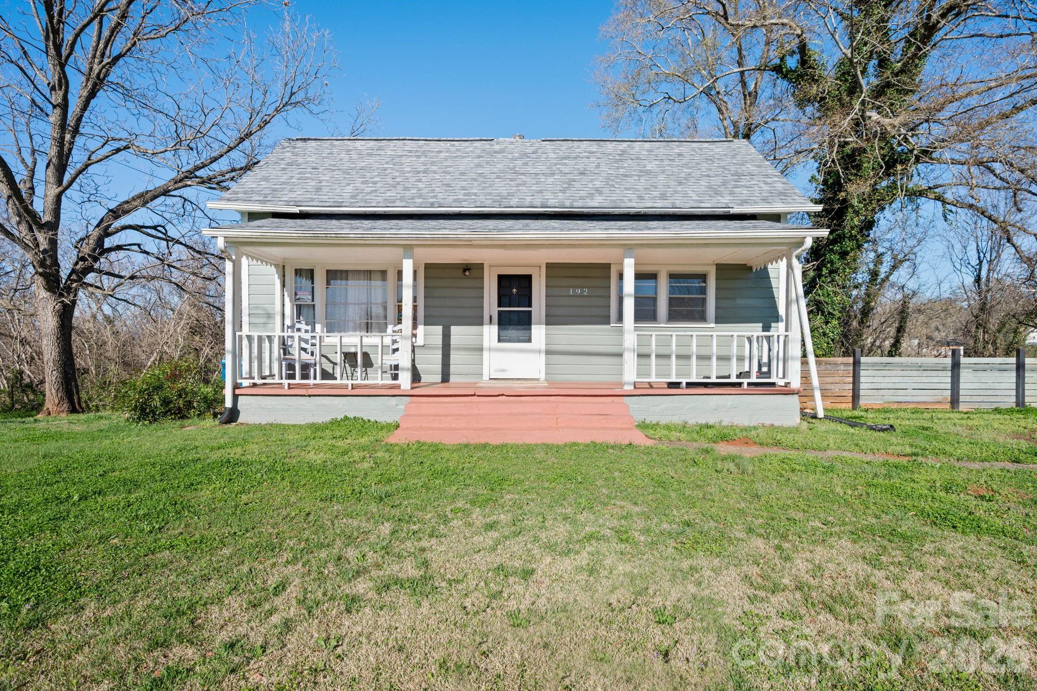 Welcome home to this beautifully updated 2-bedroom, 2-bathroom home in a quiet neighborhood in Ellenboro, NC. From the moment you arrive, you'll love the inviting front porch, perfect for morning coffee or relaxing evenings. Inside, the primary bedroom features a beautiful handcrafted wood ceiling that adds warmth and character. The large kitchen offers plenty of space for cooking and gathering, while the spacious bedrooms and large bathrooms provide comfort and functionality.
Thoughtful updates in 2022 include LVP flooring throughout, fresh paint, updated bathrooms (including the addition of a second bath with laundry), kitchen improvements, fixtures, HVAC, new electrical panels inside and out, and a new roof. All appliances remain, making this home truly move-in ready.
Outside, enjoy the fenced-in side yard, ideal for pets, gardening, or relaxing in your own private outdoor space. With generous room sizes, great updates, and a peaceful setting, this home offers the perfect mix of charm and convenience. Don’t miss the opportunity to make this lovely Ellenboro home yours.