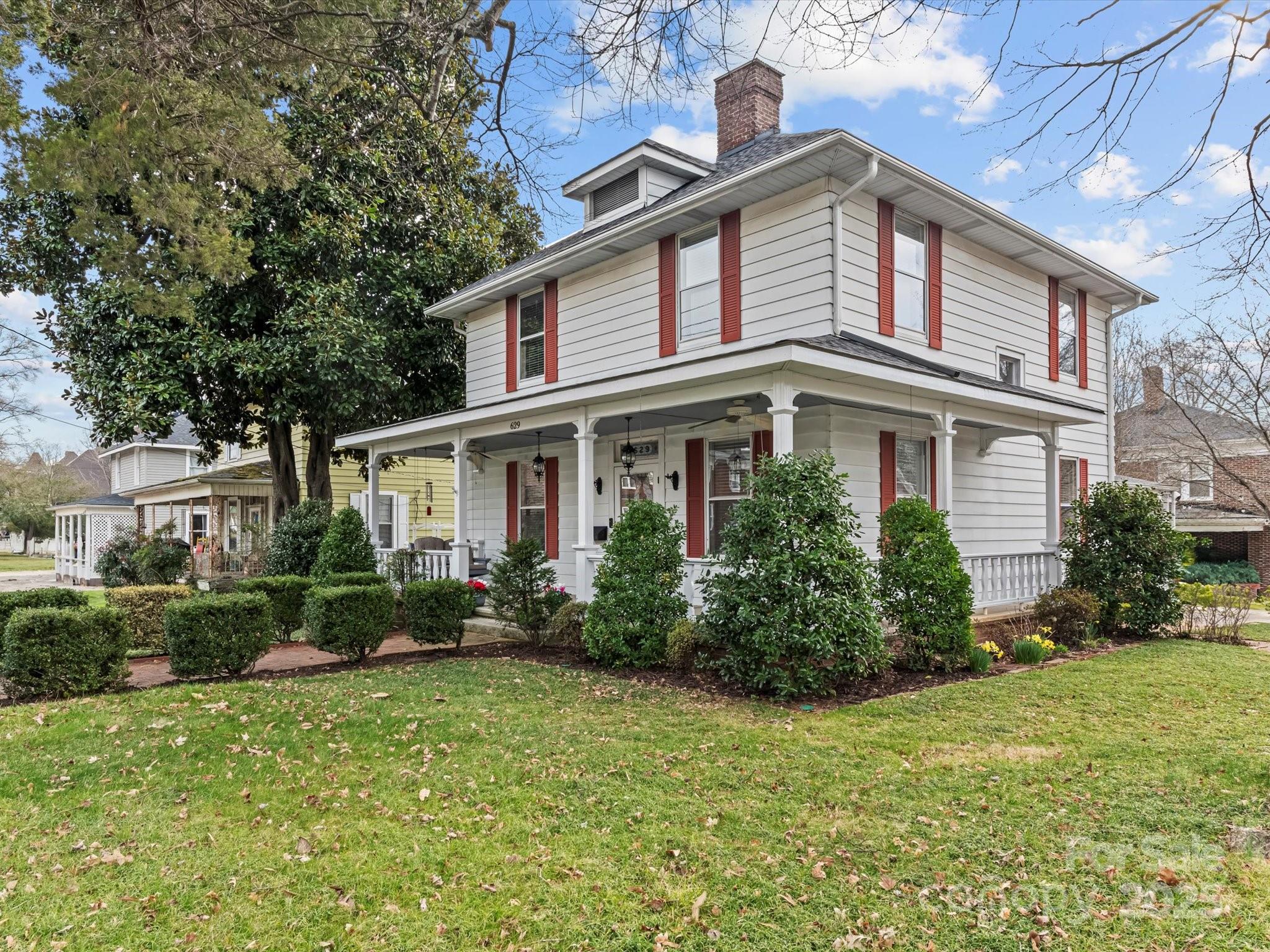 This stunning historic home is nestled in Salisbury’s sought-after West Square Historic District, just minutes from downtown dining, shops, and cultural attractions. Built in 1916, this home is filled with character, featuring 10-foot ceilings, original hardwood floors, and classic architectural details. The main level offers an inviting foyer, formal living and dining rooms, a spacious kitchen, and a cozy flex space. The large front porch is perfect for relaxing, while the covered back deck overlooks the private brick courtyard.Upstairs, you’ll find 4 spacious bedrooms with charming historic touches throughout. The basement workshop is meticulous and a perfect space for woodworking or hobbies. Mature landscaping surrounds the home, adding to its curb appeal. This property is eligible for the Historic Preservation Incentive grants. These grants are available for exterior maintenance projects for houses within Salisbury Local Historic District. Contact Listing agent for more details.