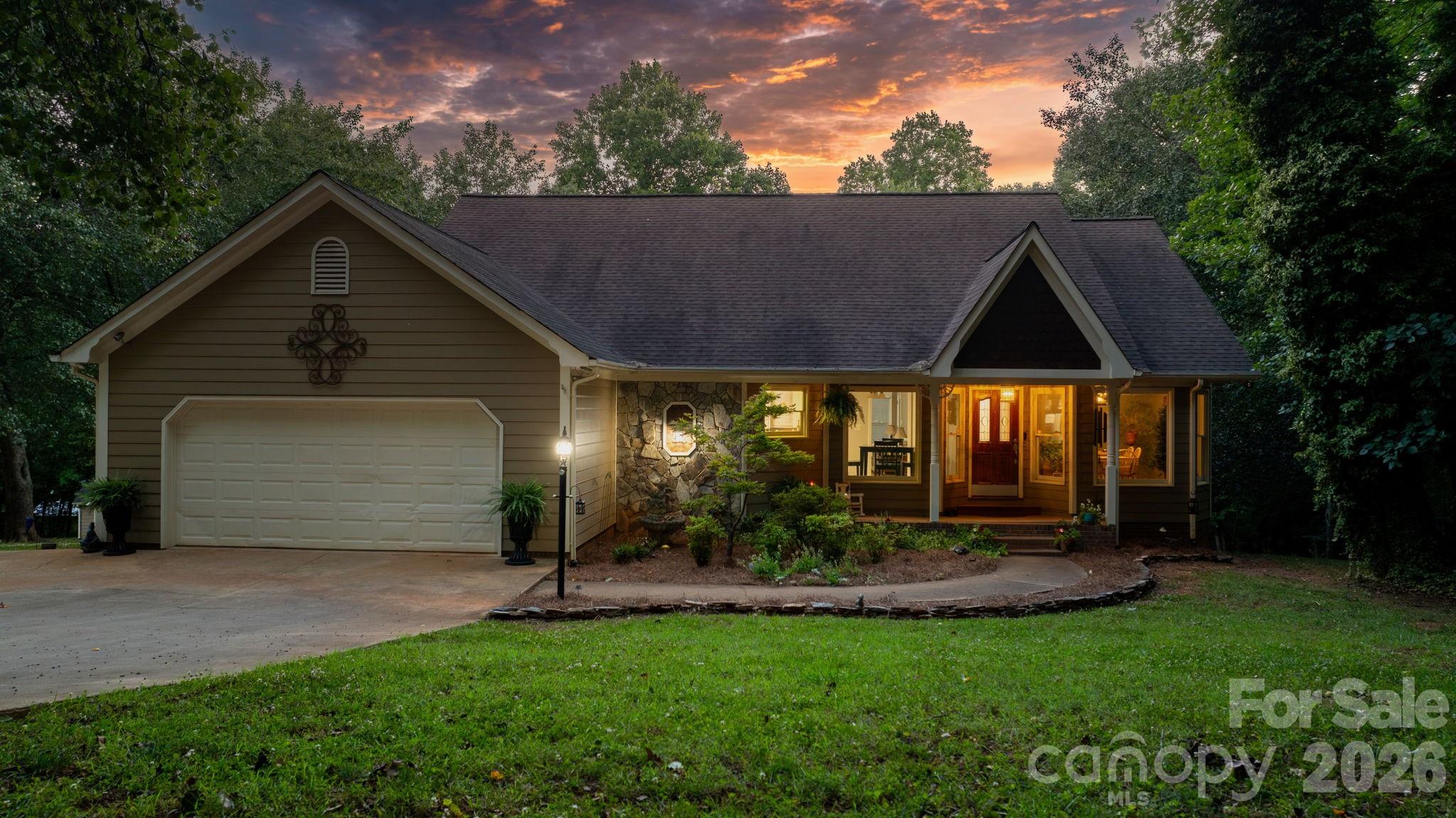 Beautiful and private 3 BR / 3 BA home hidden away off a cul-de-sac. This appox 2,997 sq ft home sits on approx. 4.83 acres and has tons of space for living, entertaining, working, and extra storage! Hardwoods in living room and down the hall. Cathedral ceiling in the living room, tray ceilings in dining and master bedroom! Walk-in closests. 2 bonus rooms in finished basement along with office space, open living area, garage, and storage rooms. A lot to see! On the property is also a large 897 sq ft detached garage with 2 garage doors, electricity, and insulation, attached to that is a 3 car carport appoox 864 sq ft. Beside it sits a large 1,716 sq ft partially open building with concrete floors. The property does include Deeded access/Divided interest in the pond and dam 2 lots over from the property.