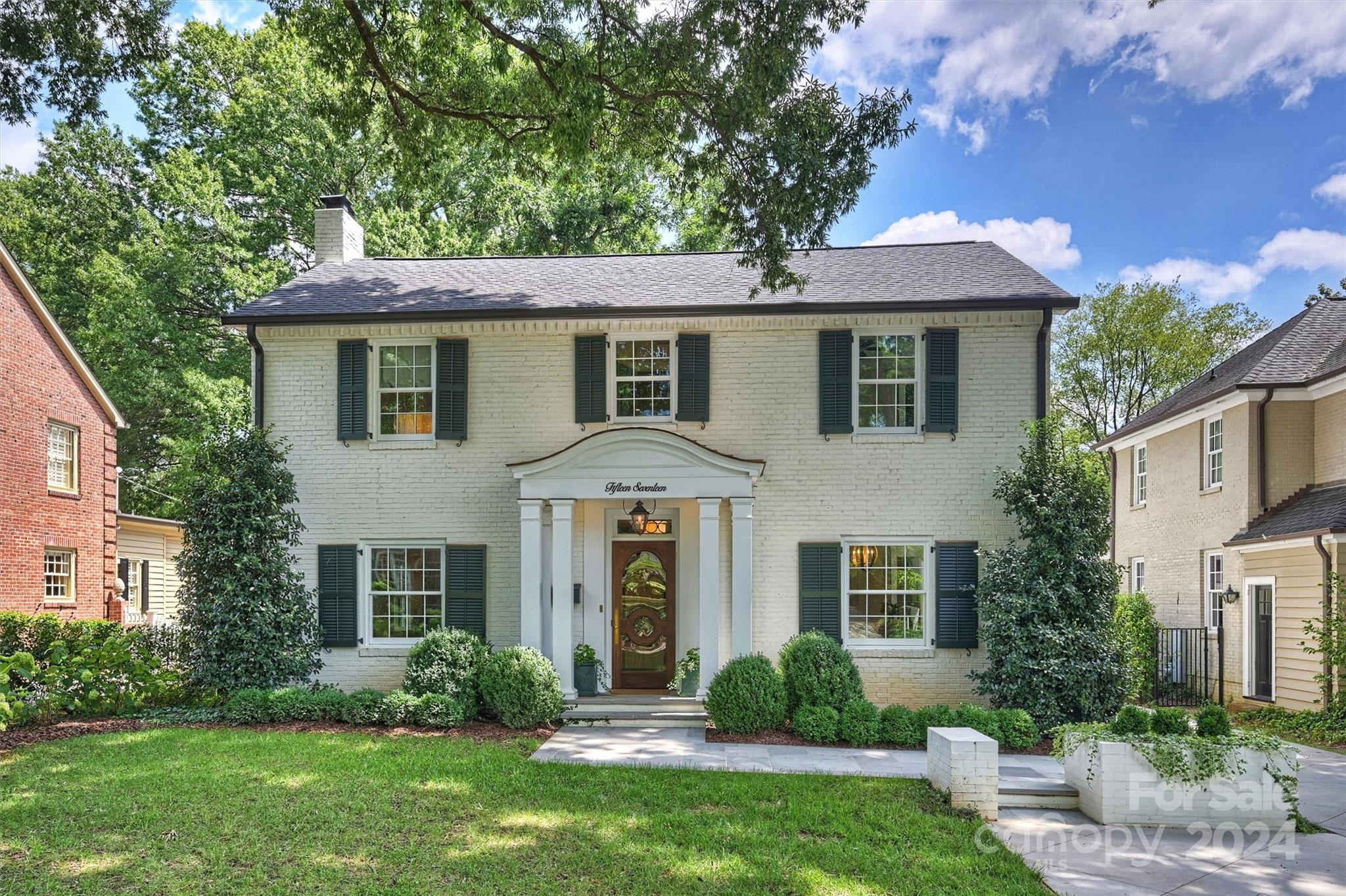 Exquisitely renovated top to bottom, this 5 bed, 5.5 bath home is located on one of Eastover's most desirable streets! Elegant hardwoods, intricate moldings, & an expansive open floorplan are just some of the features you will love. Chef’s kitchen boasts custom cabinetry, quartzite countertops, high-end Thermador & Wolf appliances, large center island & highly functional scullery. The spacious family room, accentuated by natural wood beams & original exposed brick leads to the covered porch & patio. Incredible great room/bonus with vaulted shiplap ceilings & full bath! Primary Suite includes a fireplace, 2 walk-in closets, & luxurious bath with marble finishes, while the 4 secondary bedrooms offer unique charm w/ 2 bedrooms equipped w/ en-suite baths. Front & side covered entries, fully fenced yard w/ mature privacy landscaping, & custom storage outbuilding. Walkable to the playground & popular restaurants and retail this Eastover gem is not to be missed!