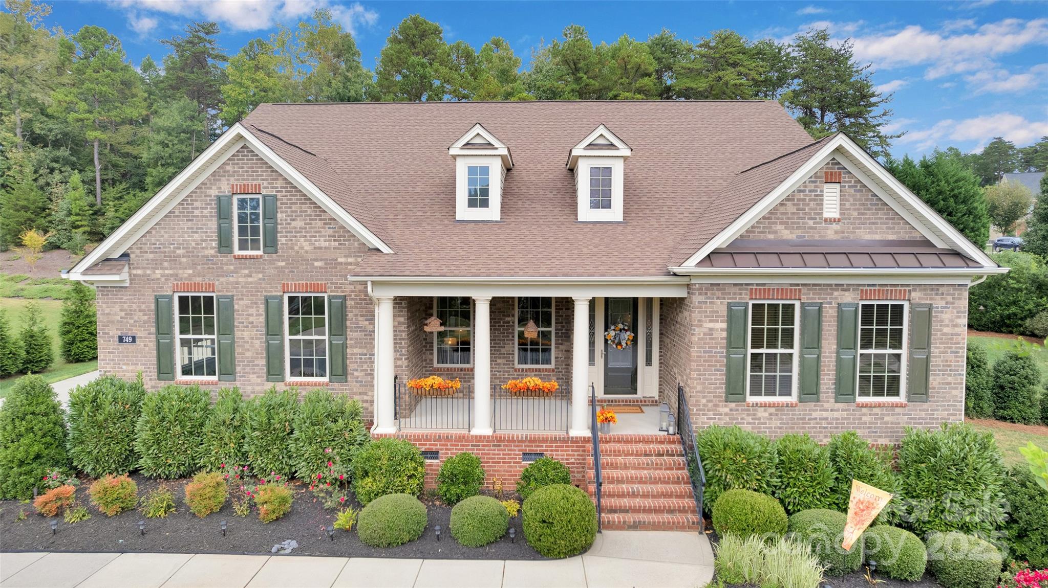 Stunning Home on Private Cul-de-Sac Lot in Fort Mill! Tucked away on a serene 0.55-acre cul-de-sac lot in one of Fort Mill’s most desirable communities, this beautiful over 3,000 sq ft home offers privacy, space, and exceptional finishes throughout. Enjoy peaceful, tree-lined views from your screened porch or relax on the extended paver patio, perfect for outdoor entertaining. The heart of the home is a gourmet kitchen featuring a huge center island, farmhouse sink, stainless appliances, and ample cabinetry—ideal for everyday living and hosting guests. The open living area showcases elegant coffered ceilings. A spacious flex room offers versatility as a formal dining room or second sitting area, while the large study with French doors is perfect for working from home. The split-bedroom layout provides privacy, with a luxurious primary suite boasting dual vanities, two walk-in closets, and a spa-like bath. Two additional bedrooms and a full bath are also located on the main level. Upstairs, you'll find a generous bonus/bedroom with a full bath, ideal for guests or a media/game room. Curb appeal abounds with a classic rocking chair front porch, inviting you to relax and unwind. Located in the award-winning Fort Mill School District, this home is a rare find combining comfort, style, and access to amenites like Ann Close Springs Greenway. Don’t miss your chance to own this exceptional home in a prime Fort Mill location!