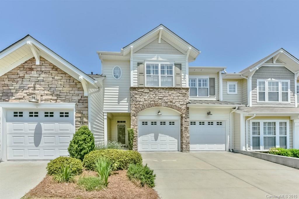 Sophisticated Town Home in amenity rich Lake community moments to Charlotte.  PRIVATE Patio with Yard! Pristine, maintained with loving pride.  Beautiful cabinetry, built-ins & archways.  Chef’s Kitchen with granite, stainless steel appliances, tile backsplash, Bkfst bar, work island & large pantry. Open Loft/Study/Play Area.  Master Suite with tray ceiling, separate deck, garden tub & shower. Community marina, golf course, tennis courts, community center, restaurant, beachside pool & fitness!