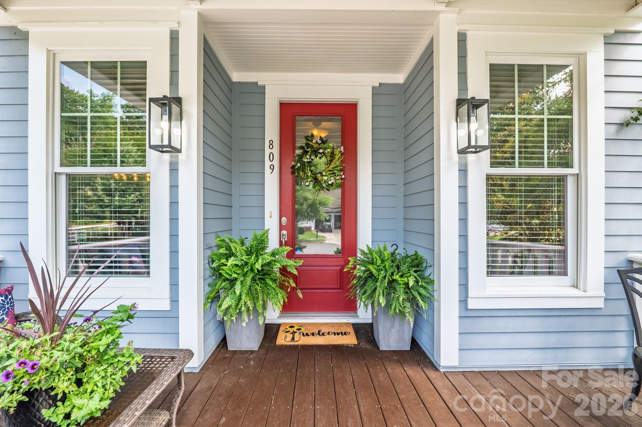 Southern charm meets the Baxter Village lifestyle in the River District.
Enjoy a more private setting in Baxter Village at 809 Elswick Court, tucked on a cul-de-sac with a screened porch and tree-lined backyard. Street has access to the Carolina Thread Trail system leading to the Catawba Park.

From the blooming magnolia trees to the cheerful front door and THREE welcoming porches, this home captures the warmth and character of Fort Mill living. A grand double-porch entry opens to a beautiful foyer with hardwood floors throughout the main level and stairs.

With over 2,500 sqft, this home offers 4 bedrooms, 2.5 baths, a spacious kitchen with abundant cabinetry, generous counter space, and an eat-in bar that opens to the family room. The screened porch overlooks the private wooded backyard—perfect for relaxing, entertaining, or enjoying Southern sunsets from a rocking chair.

The primary suite features tray ceilings, a lovely bath with separate soaking tub, and his-and-her walk-in closets. Two secondary bedrooms, including one currently used as an office, have access to the front balcony porch. Well-cared for and loved, Hot Water Heater replaced 2025 and AC unit replaced in July 2023!

Nestled between Catawba Park and Baxter Town Center, this home offers full access to Baxter Village amenities, including 2 pools, clubhouse, tennis courts, miles of trails, community events, shops, restaurants, and beloved neighborhood traditions.

More good news: SCDOT has proposed a 10-foot shared-use path along New Gray Rock Road for pedestrians and bicyclists, extending from Stratford Run Drive to Tega Cay’s Catawba Park and connecting with existing trails. See SCDOT website for details on this incredible community pedestrian addition: https://new-gray-rd-shared-use-path-scdot.hub.arcgis.com/pages/overview-of-proejct.....

Southern charm, endless amenities, award-winning Fort Mill Schools, and convenient access to I-77 and Kingsley—809 Elswick Court has it all!