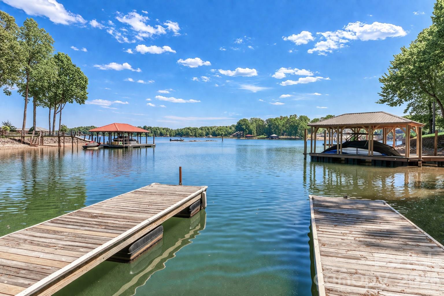 Deep Water Cove with Sweeping Main Channel Views, Private Dock and Move-In Ready Condition.  This home at 119 Shelter Cove Lane offers the Lake Norman lifestyle that buyers dream about.

Just imagine starting your mornings with coffee overlooking the water, spending afternoons boating from your private dock, and ending the day watching the sunset reflect across the main channel from the screened porch. Whether you’re seeking a full-time residence or a waterfront retreat, this home offers the space and amenities to enjoy every season on the lake.


Designed for both everyday comfort and entertaining, the home features spacious gathering areas filled with natural light, a dramatic two-story family room with stone fireplace, and multiple indoor and outdoor spaces for hosting family and friends. The main-level primary suite provides convenience and privacy, while the upper level offers flexible accommodations for guests.


The lower level elevates the lifestyle even further with a dedicated executive office featuring four workstations, a fully equipped exercise room, an expansive recreation and bar area with pool table, pinball machine, kegerator, refrigerator and under counter ice machine.  The professionally designed theater room is perfect for immersive movie nights. The dog wash station, abundant storage, and numerous included furnishings and amenities add to the home’s exceptional functionality.


Recent improvements provide peace of mind, including a new roof in 2024, recently replaced HVAC systems (2017, 2025, and 2025), newly refinished hardwood floors on the main level, new carpeting, and fresh neutral paint on the upper levels, creating a move-in-ready opportunity with room to personalize over time.


Rarely does a waterfront property combine deep water, main-channel views, a private dock, extensive amenities, and such exceptional value in one offering. Experience the very best of Lake Norman living at 119 Shelter Cove Lane.