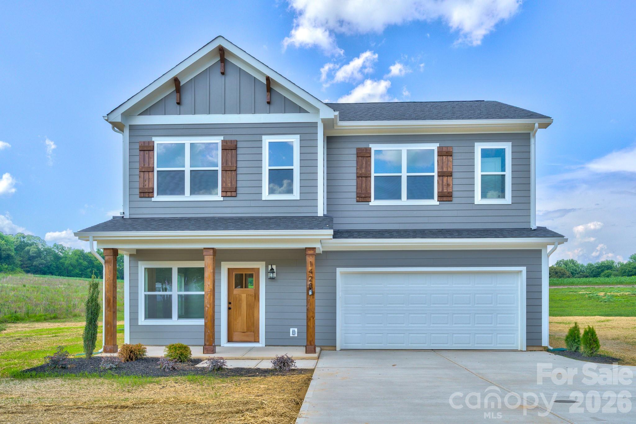 This nearly completed new construction offers a beautiful home with an inviting kitchen that features a large island and a pantry. The open layout combines the living, dining, and kitchen areas, creating a spacious feel. The main level also includes a half bath, an office, and a large sunroom. Additional features of the home include a covered porch and a two-car garage.

On the upper level, you will find four bedrooms and two full baths. There is an extra bonus room that could serve as an additional office, playroom, or sitting area. For added convenience, the laundry room is located on the upper level. This home will be completed soon, and professional photos will be available shortly.