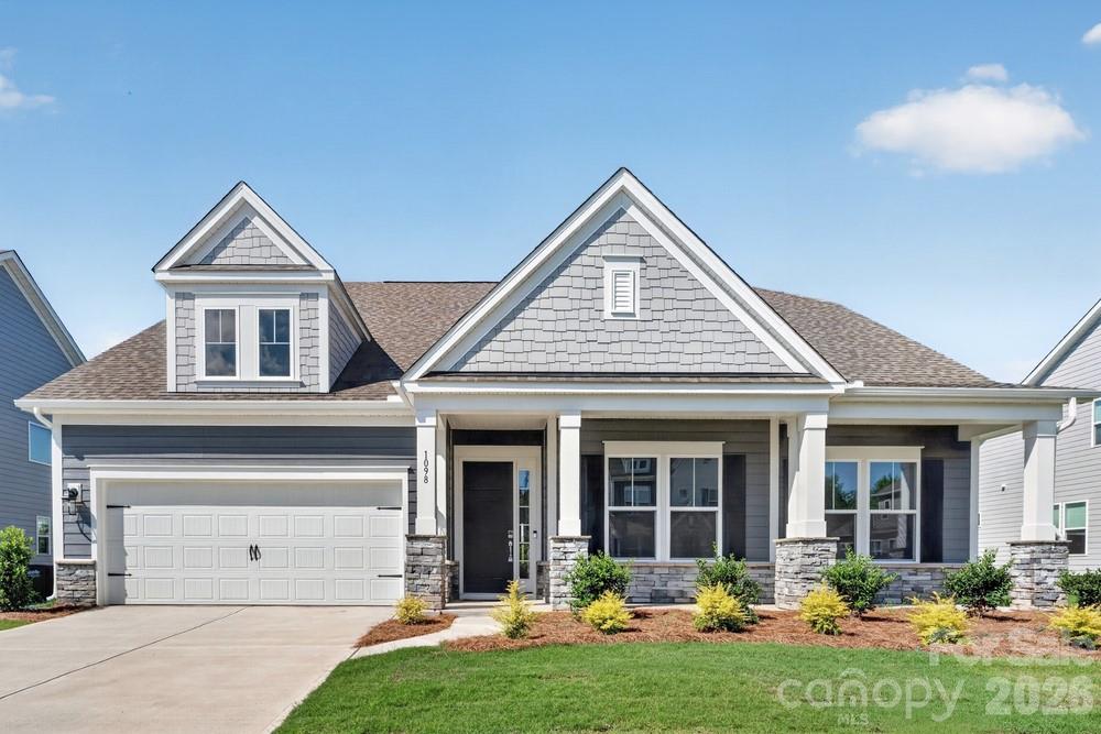 What's Special: Covered Patio | Single Level Living | North Facing Lot. New Construction – Ready Now! Built by Taylor Morrison, America’s Most Trusted Home Builder. 
Welcome to the Carlyle at 1098 Sugar Creek Road in Estates at Sugar Creek! Step inside from the welcoming front porch into a bright foyer that opens to a versatile flex space, perfect for a home office or sitting room. Just beyond, the home unfolds into an open great room featuring a cozy gas fireplace, creating a warm and inviting centerpiece for everyday living and entertaining. The great room flows seamlessly into a casual dining area and a beautifully designed gas gourmet kitchen with a large center island, ideal for gathering and meal prep. Tucked privately at the back, the primary suite offers a spacious retreat with a well-appointed bath, walk-in closet, and convenient access to the main living areas. Two additional bedrooms and a full bath are thoughtfully positioned on the opposite side of the home, providing comfort and privacy for family or guests. A formal dining room sits just off the kitchen for more elegant occasions, while a dedicated laundry room leads to the attached garage for added convenience. Outdoor living shines with a covered patio located off the great room and casual dining space, perfect for relaxing or entertaining year-round. Enjoy easy access to I-77, I-485, and Highway 521, plus the highly sought-after Ballantyne Bowl with new restaurants and lively community events. Your new home is also surrounded by natural beauty, with nearby Carolina woods, scenic parks, beautiful golf courses, and more. Additional Highlights Include: 30" cooktop gourmet package - gas and laundry tub. MLS#439332