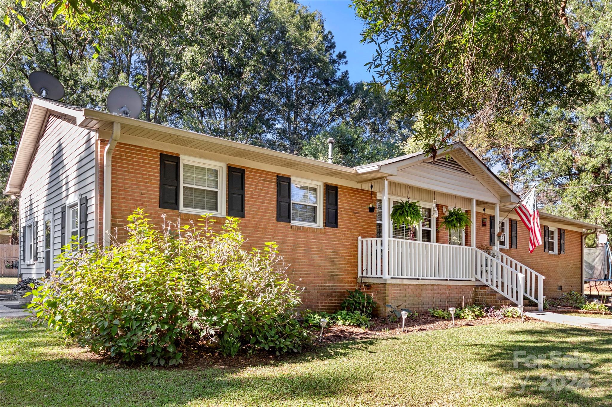 Welcome to this charming 3-bedroom, 1.5-bath brick ranch nestled in the heart of Lancaster, SC! This well-maintained home offers comfortable living with fresh paint throughout, adding a modern touch to its classic appeal. The custom kitchen cabinets provide ample storage and are perfect for the home chef. Step outside to enjoy the fully fenced back yard, ideal for pets and outdoor activities. You’ll also find a spacious wired building with a roll-up door, offering endless possibilities for a workshop or extra storage. Don’t miss this opportunity to own a move-in ready home in a quiet, friendly neighborhood with NO HOA!