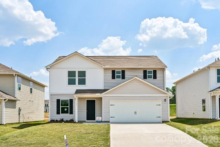 Welcome to your spacious and elegant home in the desirable Buffalo Creek. The Dupont Plan is a new 2-story home with an open layout that seamlessly connects the Living, Dining, and Kitchen areas, perfect for modern living. The chef’s kitchen features exquisite cabinetry, granite countertops with a , and stainless steel appliances, including a smooth-top range, microwave hood, and dishwasher.
This thoughtful layout offers a spacious bedroom and full bathroom on the first floor. The second floor houses the serene primary suite with a luxurious en-suite bath, dual vanity sinks, and an expansive walk-in closet. Two additional bedrooms share a stylish full bathroom with a Loft Space ideal for a home office or relaxation area. A walk-in Laundry room and energy-efficient Low E insulated dual pane windows add practicality. A 1-year limited home warranty provides peace of mind.