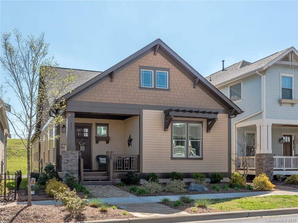 Great cottage plan in the highly sought after Riverwalk Community! Amazing location close to The River District restaurants, shops, kayak launch & walking/biking trails. This home features wide-plank hardwoods, double tray ceilings, crown moldings. Kitchen is upgraded with granite counters, tile backsplash, SS appliances. Master bath has large walk-in tiled shower, garden tub & dual vanities. Backs up to the greens with no homes behind it. Why wait for new construction? This home is like new!