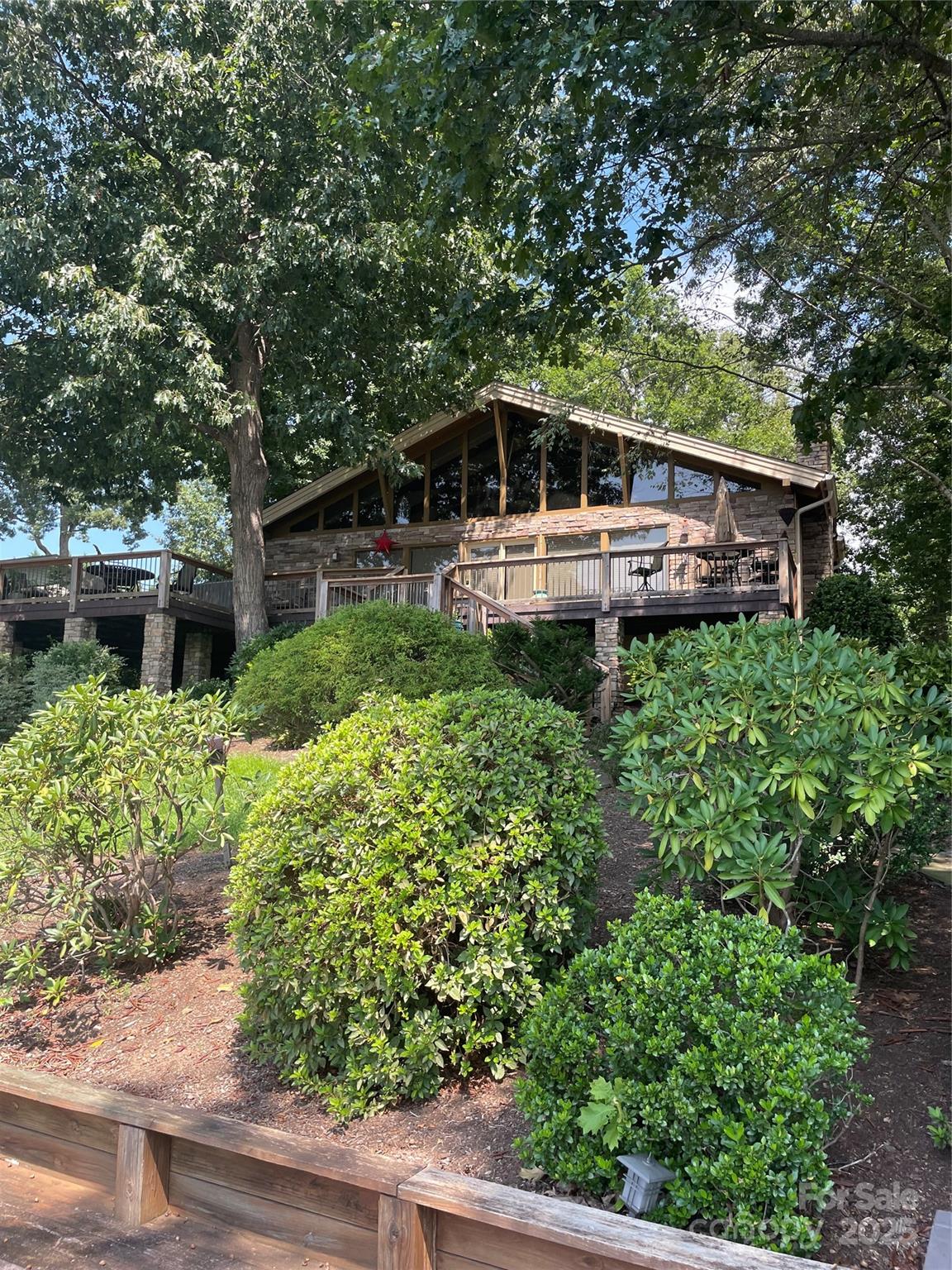 This classic lake house located on beautiful Lake Hickory NC is ready and waiting for those looking for a waterfront residence. Home offers plenty of areas both inside and outside to unwind and relax. Beautiful bedrooms, flooring, exposed beams ceiling, bathrooms and kitchen all await you and your guests. Make those long lasting memories by enjoying your own private boardwalk, patio areas, gazebo and boat house. Conveniently located just minutes from Hickory, Charlotte, Boone, Winston Salem. the Wilkesboro's and the high country. Entire home was tastefully update 15 years ago.
Home furnishings, art work, patio furniture and pontoon with 200 HP Yamaha can be purchased separately.
Have to  come see this because pictures just cant capture what this property has to offer.
Shopping, dining, recreation are all available in teh area.