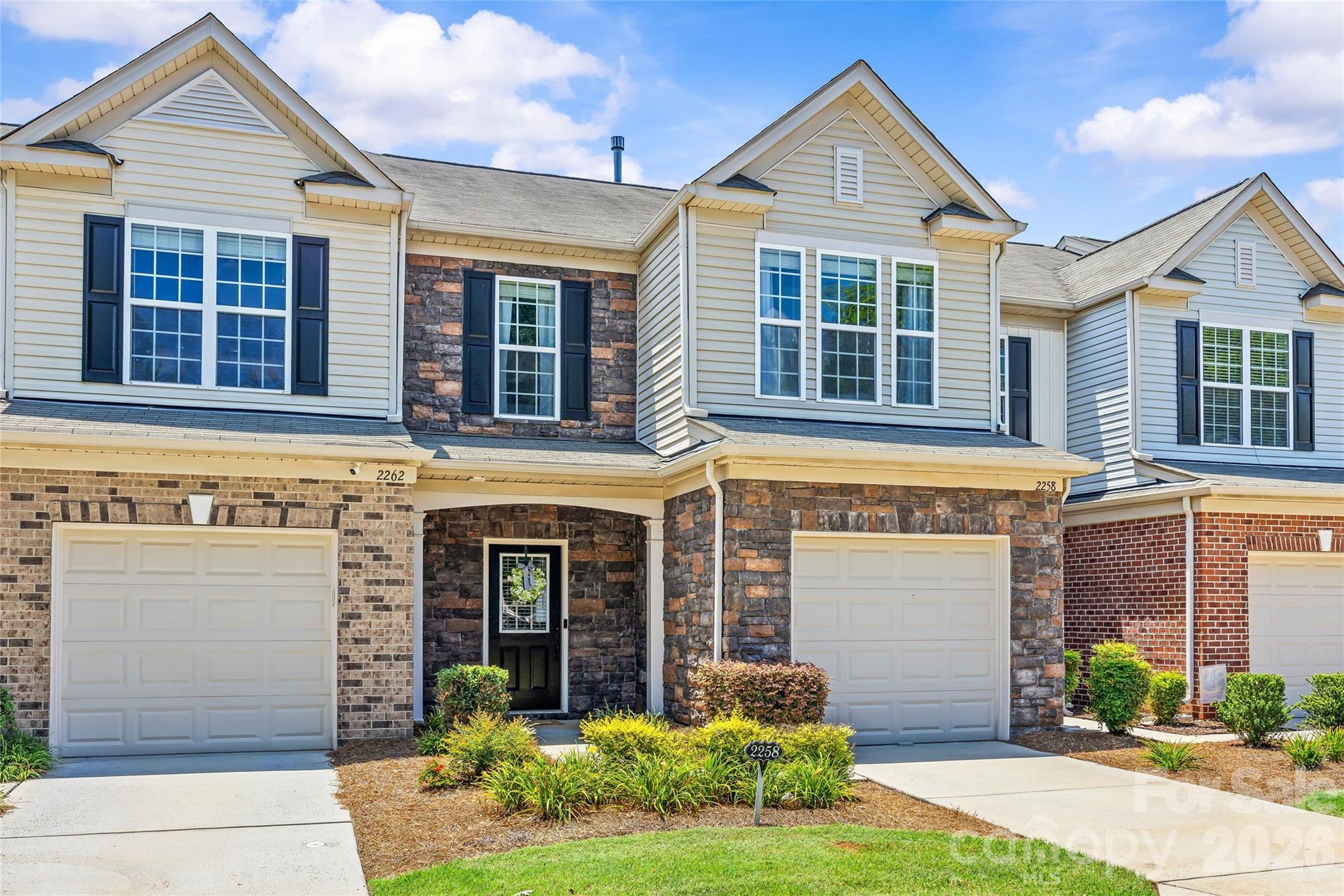 Welcome to Park South Station! This charming 2 story townhome is 1,625-sqft, featuring 3 bedrooms, 2 full baths, 1 half bath, and a 1-car garage. The main level boasts an open floor plan with a spacious living room that includes a gas fireplace and built-ins ideal for a home office or beverage bar. The kitchen is outfitted with cream-colored cabinetry, granite countertops, and KitchenAid and Maytag stainless steel appliances, along with bar seating.

The primary suite is highlighted by a tray ceiling, an upgraded closet system, and an ensuite bathroom that includes a double vanity, a generous shower, and a water closet. On the second floor, you will find two additional bedrooms and a full bathroom. The laundry room has Samsung washer and dryer (2023) that will be included! 

The backyard features a patio perfect for relaxation, privacy fencing on the sides, and plenty of natural light as you sit up higher than your neighbors! Additionally, there is convenient street parking available right out front for you and your guests.

Don’t forget to explore the community amenities, which include a clubhouse, pool, fitness center, dog park, playground, and easy access to the Little Sugar Creek Greenway. The HOA also included lawn care. The community is conveniently located just a short drive from South Park, Uptown, or Ballantyne.
