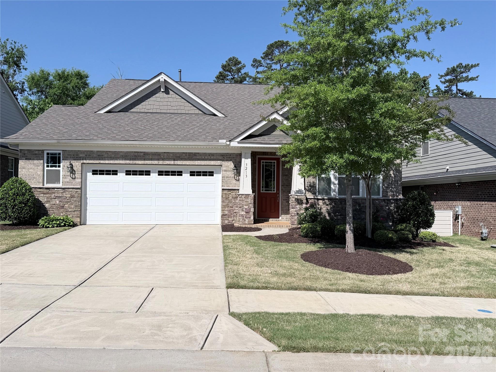 Welcome home  this beautifully maintained one story homesite backing to mature trees, offering a private setting and peaceful views from the covered rear porch, and a view of the community park from the front of your home. The home features enhanced vinyl plank floors throughout the main areas.The open kitchen features granite countertops, a custom hood, large island, soft-close cabinetry, and stainless-steel appliances, flowing seamlessly into the dining area and family room. The main-level Primary Suite includes a tray ceiling, walk-in closet, and spa-like oversized tiled shower with dual shower heads. There are two guest bedrooms, bedroom #2has anon-suite, bedroom #3 has a bathroom directly outside the room, which provides flexibility for visitors or a home office. Large laundry room with loads of cabinets and large utility sink.The current owners have completed several thoughtful upgrades including  window blinds, fans,  throughout, as well as a natural gas line for your barbecue adding to the home’s move-in-ready convenience. The two car garage has a four foot extension that gives you lots of extra storage room, as well as the exterior trash enclosure and gutter guards that reduces gutter maintenance. Say goodbye to yard work and hello to more time for what matters most, thanks to our community’s low-maintenance landscape and irrigation design.  Community features include a heated swimming pool, clubhouse, screen porch, picnic areas as well pickleball, bocce balls courts and horseshoe pit. Sonata at Mint Hill is very accessible to I-485, with easy access to shopping, restaurants and uptown.
