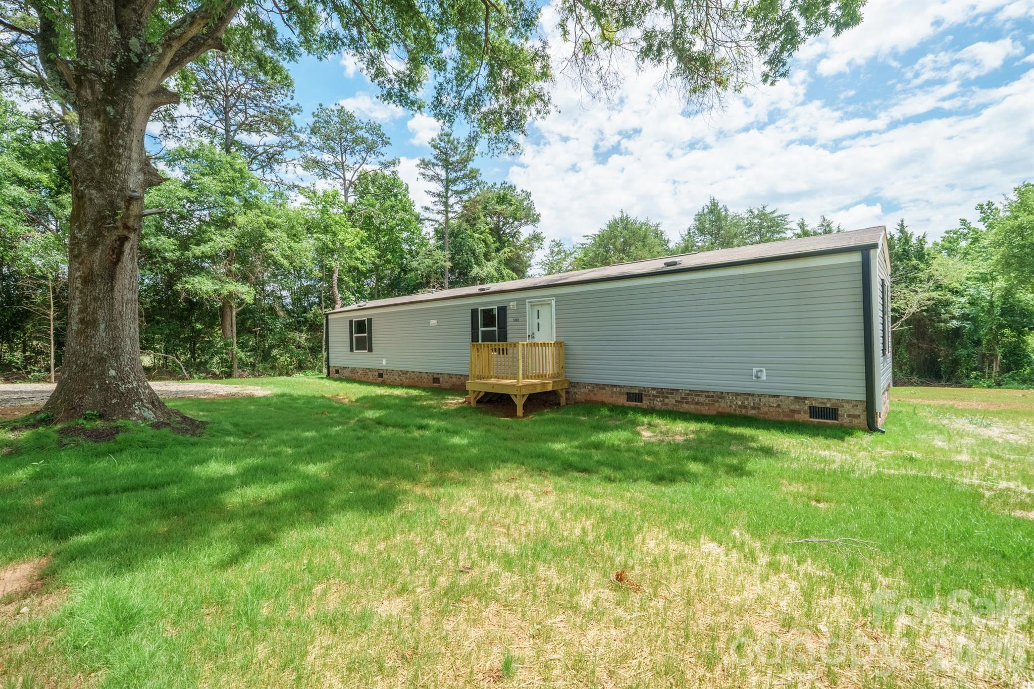 Brand new and never lived in, this 2025 home offers the perfect blend of affordability, comfort, and peaceful country living! Situated on a spacious acre lot, there’s plenty of room to enjoy the outdoors — whether you’re dreaming of a garden, play area, pets, entertaining space, or simply extra privacy. Inside, you’ll find 3 bedrooms, 2 full baths, and a spacious layout designed for comfortable everyday living. The kitchen comes equipped with a refrigerator, dishwasher, and electric stovetop/oven, making move-in even easier. This home also features a permanent foundation and land included, making financing options more accessible and ownership even more valuable. With a new HVAC and roof, this home is completely move-in ready. Enjoy the charm of country living while still having all the modern comforts you need!