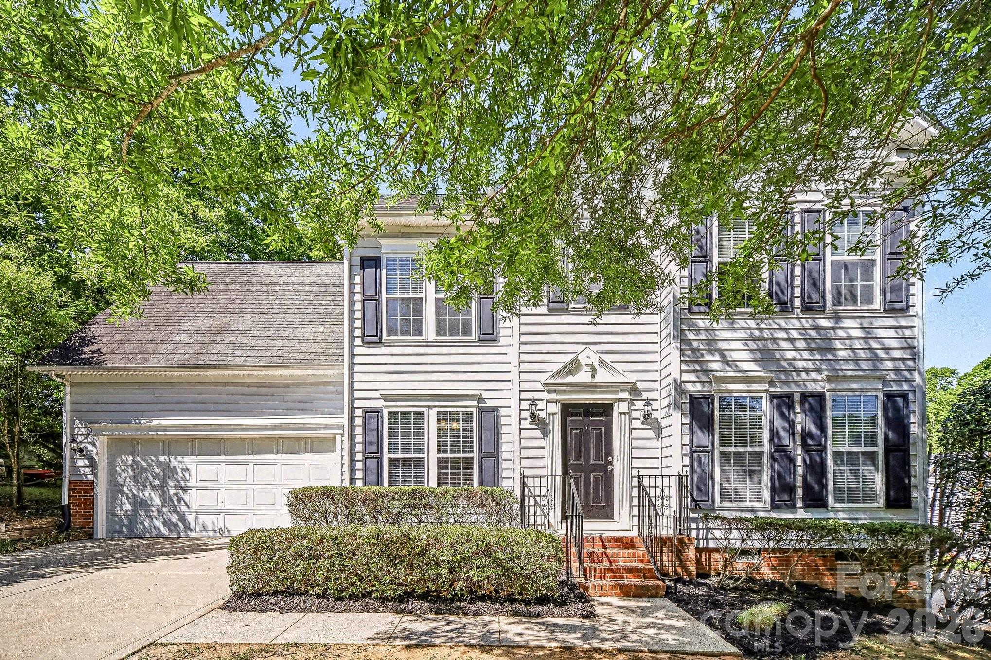 This 4-bedroom, 2.5-bathroom two-story home features an attached two-car garage and a spacious, fully fenced backyard with a private back deck. The interior layout offers both a formal dining room and a distinctive living room accented by decorative columns, while the cozy family room is anchored by a classic fireplace. Upstairs, the fourth bedroom provides excellent flexibility, serving perfectly as either a traditional bedroom or a large bonus room. While the property requires some TLC, its generous floor plan and ample outdoor space offer a fantastic opportunity to build equity and customize a home to your exact taste.