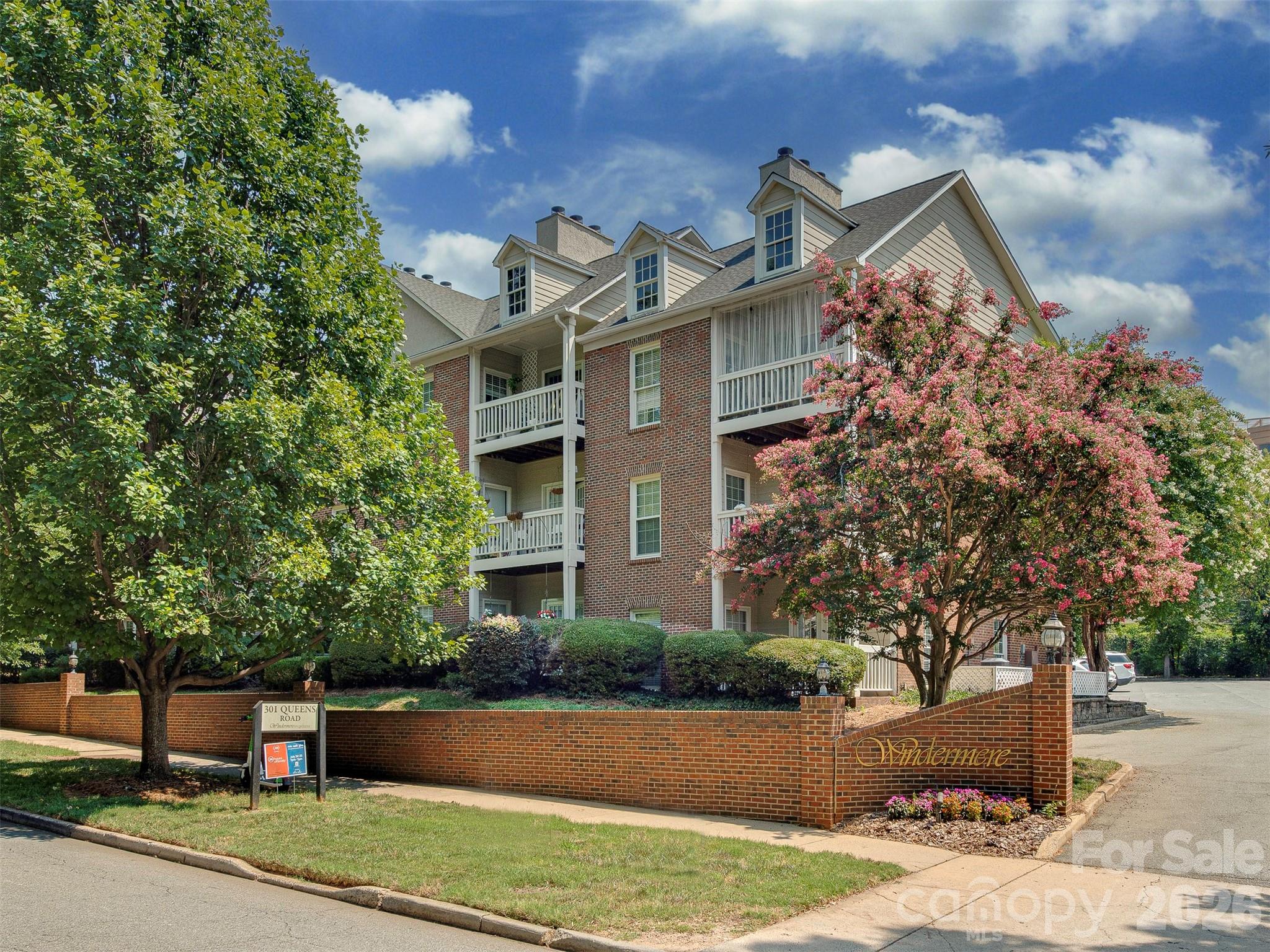 LOCATION, LOCATION, LOCATION Perfectly situated in Myers Park, adjacent to Elizabeth, with walkability to shopping, dining, entertainment, hospital, and a local Farmers Market. This 1-owner, first-floor, corner unit is sure to impress you!  Lots of natural light but mature trees for privacy. Renovated kitchen and baths with an attention to every detail.  The living area features a wood-burning fireplace and French doors leading to a quaint patio that extends your entertaining space!
2 bedrooms and 2 baths. New LVP throughout plus smooth ceilings! The complex features a completely fenced, in-ground pool!!