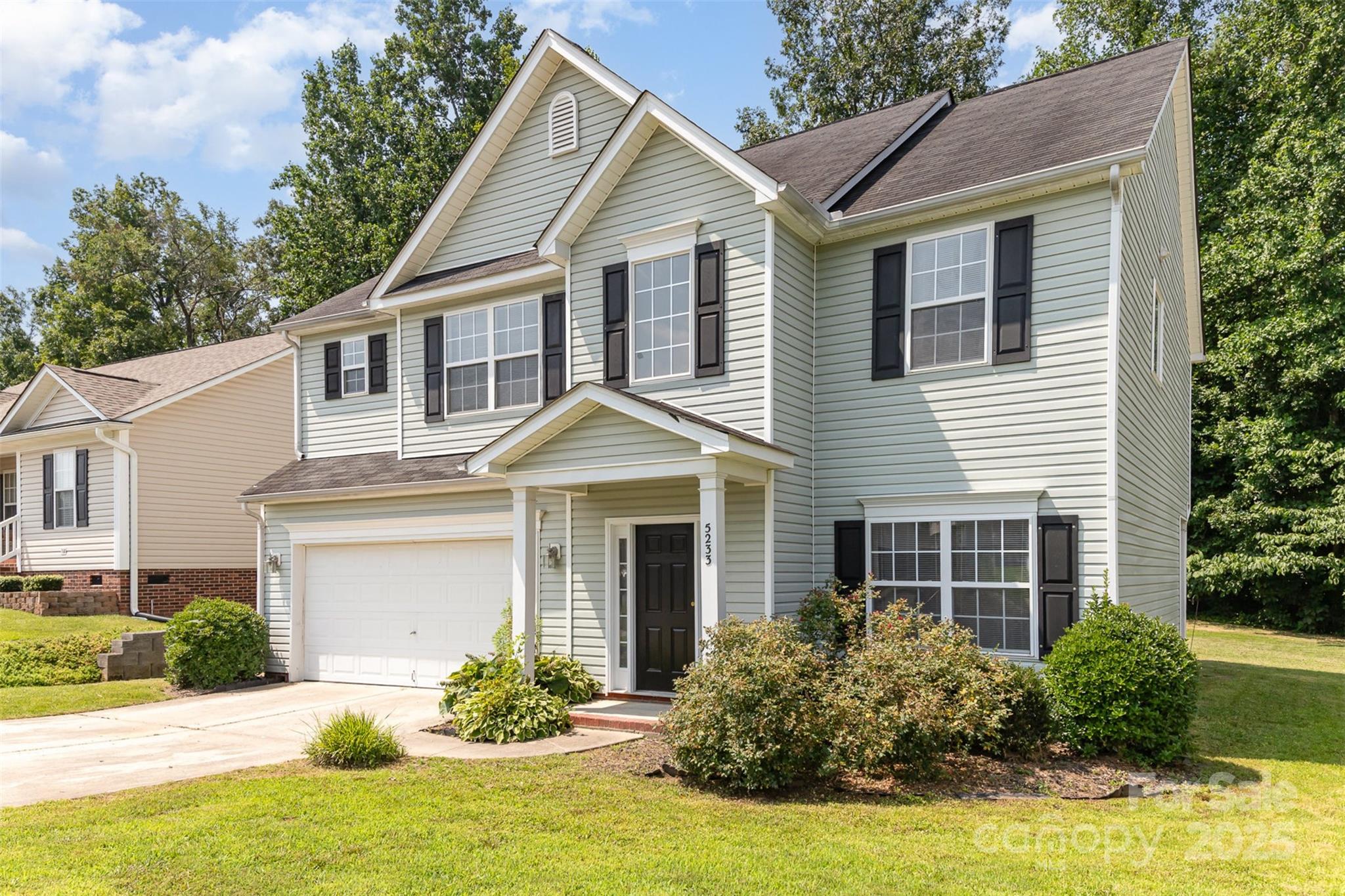 This large move in ready 4-bedroom, 2.5-bath home has a great layout with brand new carpet upstairs and durable LVP flooring throughout the main level. Upstairs you'll find a large primary and secondary bedroom, plus a Jack-and-Jill bathroom connecting the other two bedrooms. The kitchen features granite countertops and a tile backsplash. Out back, enjoy a spacious and private yard that backs up to mature trees—great for relaxing or entertaining. Tucked away on a quiet cul-de-sac street and just minutes from I-85 for a short commute to Charlotte, shopping, restaurants and activities. This home is only 2.3 miles from Lake Fisher boat rentals!!