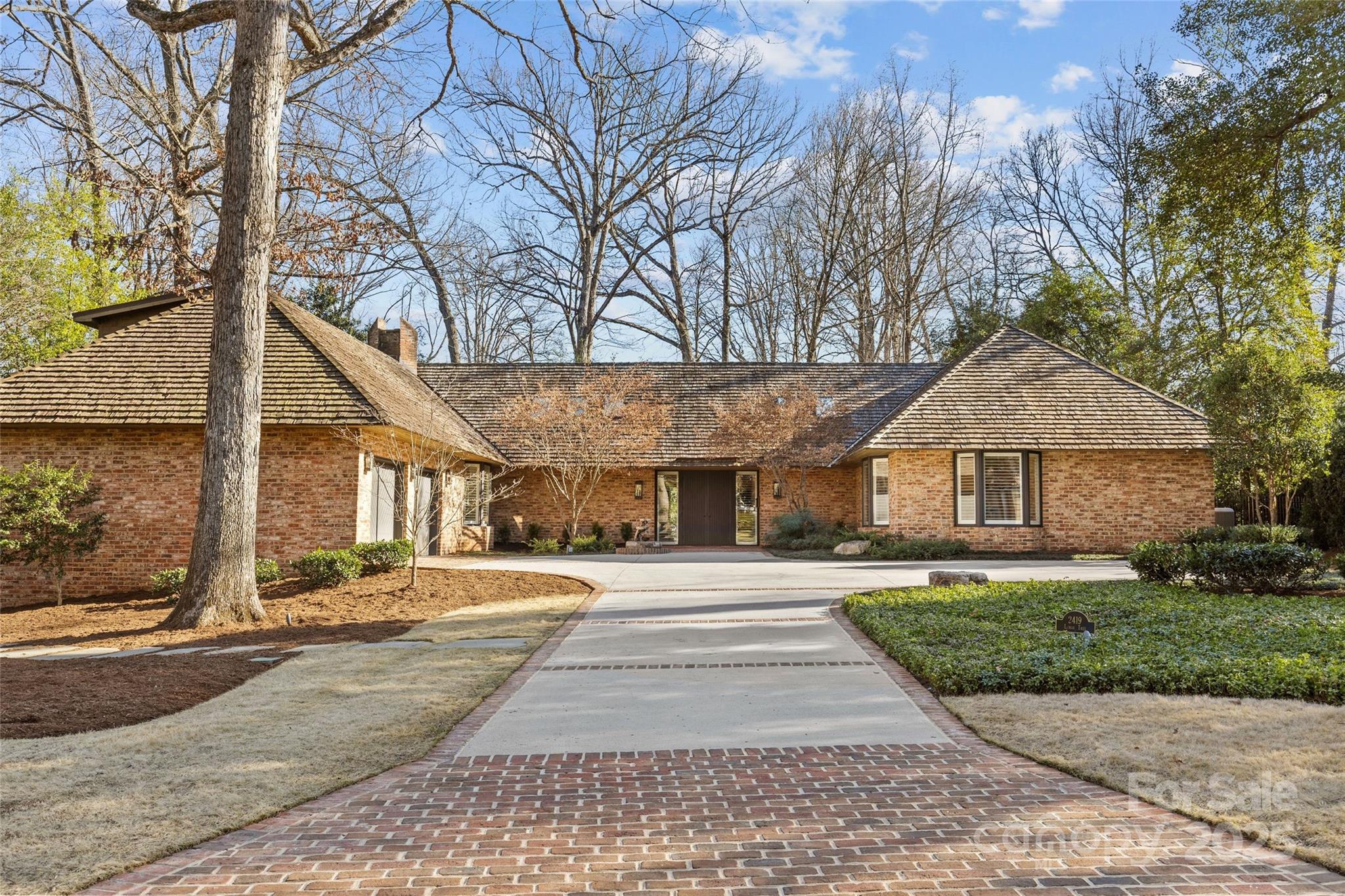 Luxury Living in Foxcroft! Enter into this stunning home and be captivated by the breathtaking three-sided glass room, filling the space with natural light. Designed for effortless entertaining and everyday comfort, the desirable open floor plan seamlessly connects the show-stopping chef’s kitchen to a sunlit dining room. Spacious main level primary suite features a beautiful bathroom and large walk-in closet with built in shelving. Three additional bedrooms and three full bathrooms plus a bonus room and half bath. Extend entertaining outdoors on incredible porch overlooking the private, fenced yard. Move-in ready, this residence perfectly blends luxury & sophistication. Convenient to restaurants & shops in the Southpark area. Easy commute to Uptown.