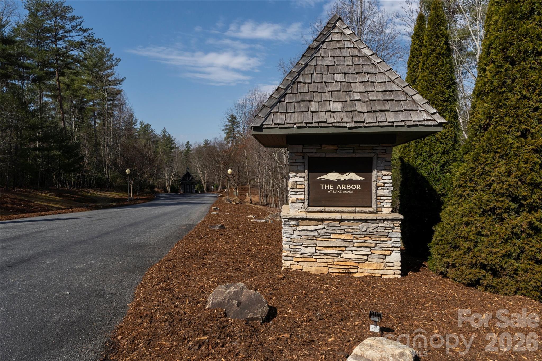 The Arbor at Lake James welcomes you. With this lot and your builder's opinion and placement of the home, you may enjoy water views and extensive mountain views of Table Rock and Grandfather Mountain.
Short term rentals allowed in the Arbor. Over 200 ft of road frontage. Community boat storage available, Nearby local marina for boat slip access and boat launch. No deeded boatslip wit this loat.
Community boatslips are being rebuilt post Hurricane Helene. Potential for rental of a boatslip from another neighbor within the community.