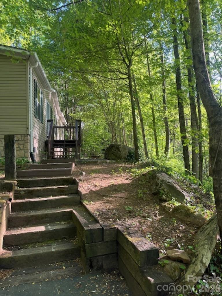 Desirable Dogwood Acres Neighborhood. 3 bedroom 2 bath doublewide in a quiet setting. Situated on generous 1.54 acres property (home is on 1 acre and an additional lot .54 acre). Just minutes from downtown Sylva, shopping, dining, hospital and breweries! Easy access to Franklin, Waynesville, and Bryson City. Featuring a functional layout, don't miss this opportunity to own a piece of Sylva!

 Spectrum fiber optic is available in this area for internet cell phone and TV.