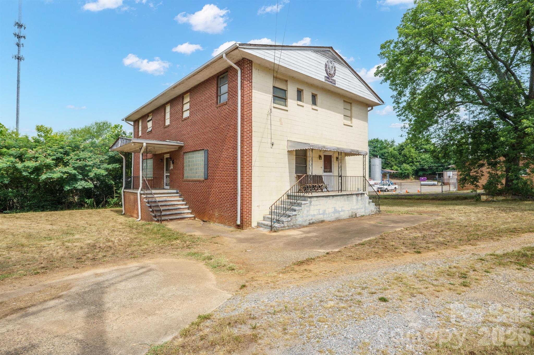 Great business opportunity in a high-visibility location! This corner lot at the intersection of Buffalo Street and N. DeKalb Street offers excellent exposure with steady daily traffic. The property is zoned NB (Neighborhood Business), making it ideal for a variety of commercial uses (buyer to verify intended use).
The two-story brick building features a partially finished basement, two bathrooms, a kitchen, and is connected to city water and city sewer. The property was previously used as a lodge and offers plenty of potential for its next owner. Electricity is currently not on, so please bring a flashlight when showing the property. Don't miss this opportunity to bring your vision to life in a prime commercial location!