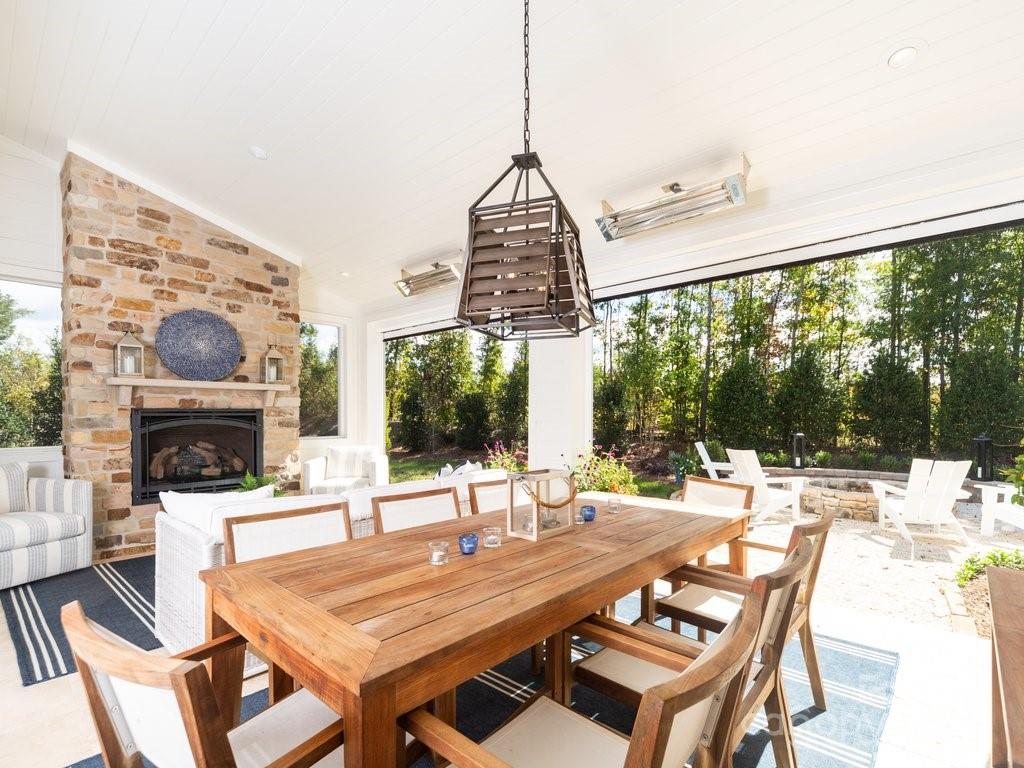 Located in Arden Mill, Fort Mill’s premier neighborhood. Builder’s personal home built & designed by Classica Homes - true custom luxury! Private cul-de-sac lot with lush landscaping & outdoor living.  Specialty trim with shiplap walls, V-Groove ceiling detail & more.  Dream Chef’s Kitchen & Scullery w 36” Wolf Range, 42” SubZero & wine fridge & 2 DW’s. Gorgeous cabinetry w Brizo faucets, custom cabinetry, marble counters & w/in pantry. 1st flr Owner’s Ste & luxury bath w heated marble floors & counters, oversized spa shower. Enormous custom closet, w laundry + 2nd laundry up. Indoor/outdoor living is seamless w a 16’ stacked sliding door off great rm. Oversized covered outdoor living rm, w travertine floors, V-groove ceiling, stone fireplace, heaters & screens. Custom firepit & an uplit lushly landscaped, private backyard. Designer lighting, 1st floor guest ste, plantation shutters, custom closets, smart home features & Sonos system.  Must-see home for those searching for the best.