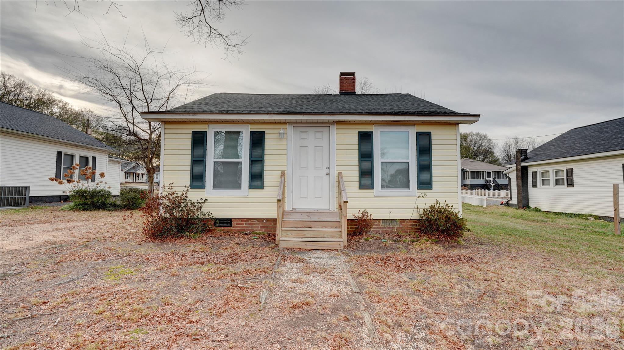 Charming cottage home in Prime Kannapolis Location!! Welcome to this beautifully maintained 2-bedroom, 1-bath home in the heart of Kannapolis. Open Kitchen/living room concept. Kitchen boasts an eat-in bar and plenty of cabinets. Large mud/laundry room.There is also space in the front of the home that can be used as a flex area or home office. Enjoy the convenience of being just minutes from shopping, dining and medical facilities, with easy access to the interstate for a smooth commute. Whether you're a first-time home buyer, downsizing or looking for a low maintenance investment, this move-in ready home is a fantastic opportunity.This property can also be sold with MLS#4326796