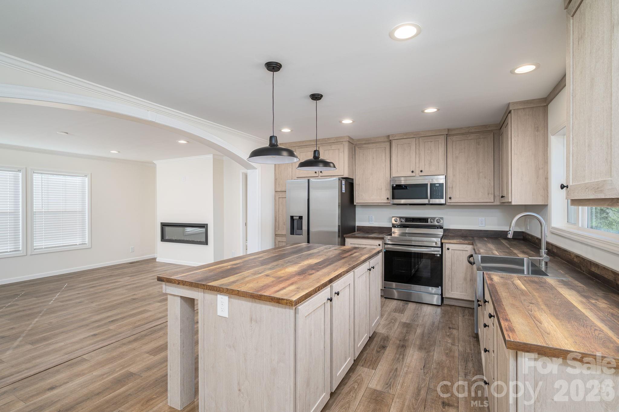 *BACK ON MARKET AT NO FAULT OF THE SELLER* This stunning 3 bedroom, 2 bathroom residence spans 1,488 square feet on a .66 acre lot in the desirable and recently developed Eagleview subdivision. The kitchen boasts a spacious island and stainless steel farmhouse sink, complemented by matching appliances. An elegant archway entrance from the kitchen leads to the living room, which features a recessed wall-mount electric fireplace. The primary bathroom is a serene retreat with a tile walk-in shower, expansive double vanity, and a substantial free standing bathtub. The laundry room offers ample cabinet and counter space, along with a utility sink for added convenience. Schedule your showing TODAY!