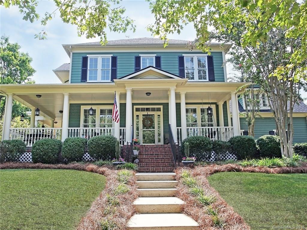 Oooh! Stunning Beauty of an original model home set in amenity rich Baxter Village! Hardwoods flow with comfort & warmth throughout the main level. New carpet, fresh paint on walls & cabinetry, new attic fan & new lighting fixtures. Plantation shutters and columns. Chef's Kitchen w/ Stainless, tile back splash and granite. Luxurious Master with Private Upper Patio! Southern Wrap Porch and lush level Yard with 6' privacy fencing. Walk to the pool, school and town center.