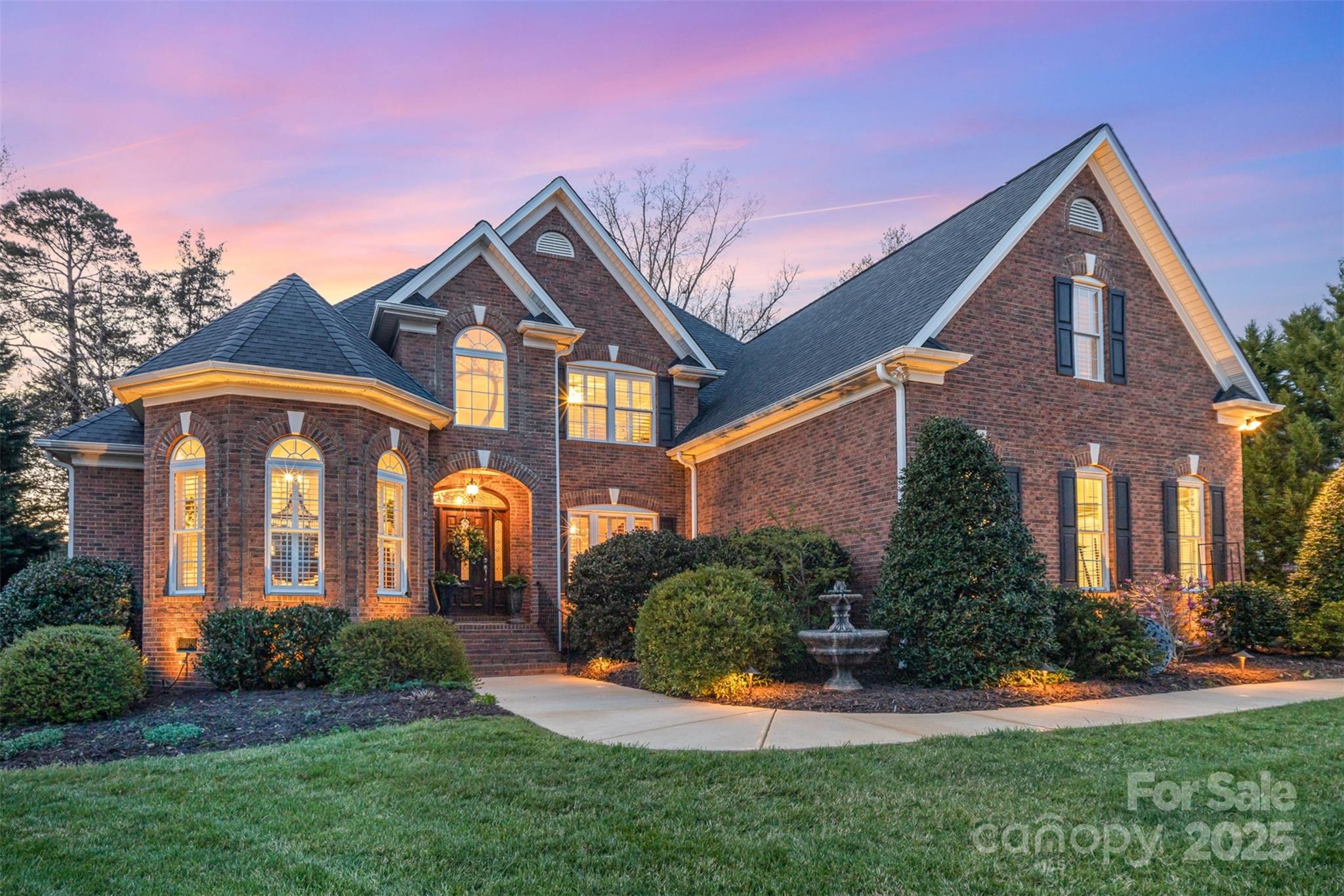 Tucked away in the desirable Meadow Lakes II neighborhood and surrounded by lush gardens and meticulously manicured landscaping, this home exudes timeless elegance and exceptional craftsmanship. Inside, a host of refined details, including custom heavy moldings, plantation shutters, two inviting fireplaces, and a large screened-in porch ideal for relaxation. The vaulted ceilings create a sense of openness and light, while the  main-level primary suite serves as a serene retreat, complete with a cozy sitting area, dual walk-in closets, and a spa-like ensuite. The 3+ side-load garage offers ample space for vehicles and hobbies alike. Outside, is enhanced by beautiful landscape lighting, a well-designed irrigation system, and a concrete patio. As part of a vibrant community, this home offers access to fantastic amenities, including a pool, tennis courts, pickleball courts, four lakes, and golf-cart friendly streets, all providing a wonderful environment for leisure and relaxation.