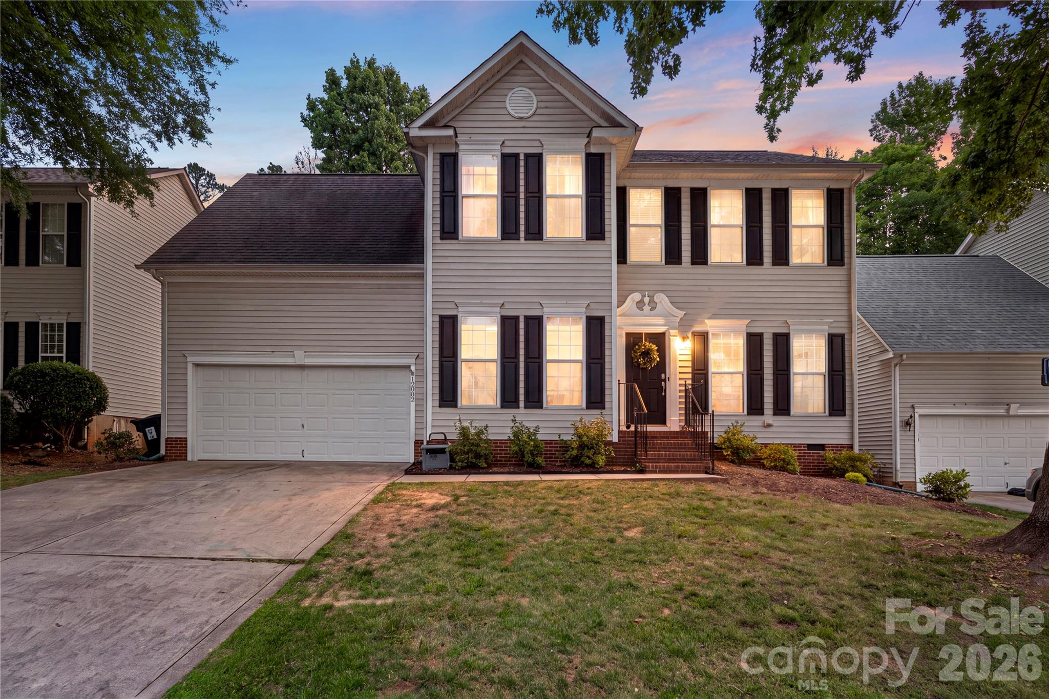 Beautiful 2-story transitional home offering 3 bedrooms and 2.5 bathrooms with nearly 2,000 square feet of thoughtfully designed living space. The main level features hardwood flooring, a spacious family room with fireplace, and a beautifully renovated kitchen (2025) complete with new cabinetry, quartz countertops, designer backsplash, beverage refrigerator, walk-in pantry, and adjoining dining area. A dedicated main-level office provides the perfect work-from-home or flex space. Upstairs, the expansive primary suite offers a walk-in closet and private ensuite bath, accompanied by two additional bedrooms, a bonus room, and convenient upper-level laundry. Enjoy outdoor living from the welcoming front porch, rear porch, and deck overlooking a wooded setting. Additional highlights include a finished 2-car garage with epoxy flooring, high ceilings, EV charger wiring, and easy access to walking trails and a neighborhood playground. Ideally located just minutes from both Pineville and Ballantyne, offering convenient access to shopping, dining, and entertainment.