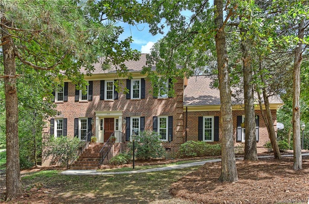 Welcome to gracious living in sought-after Providence Plantation! This stately full-brick home sits on .68 acres with mature landscaping on corner of cul-de-sac! Hardwood floors & architectural moldings grace the main level. NEW carpet in the family room, stairs & upper level! Kitchen features rich cabinetry, peninsula, granite countertop, gas cooktop. Inviting family room w/brick hearth & dual built-in shelves. Freshly painted! Large private deck, Awesome swim/tennis n'hood, top-ranked schools!