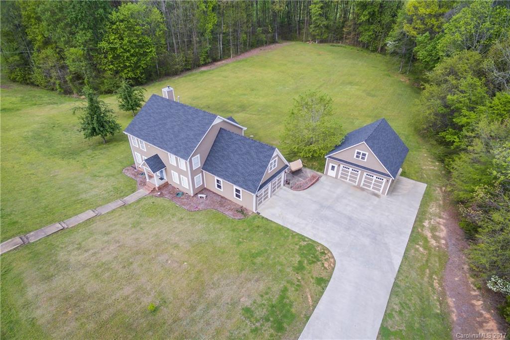 Beautiful & elegant home in a private country setting. Recent upgrades were made on this home; freshly painted, new wiring, plumbing, HVAC system, light fixtures. Chefs kitchen has high end stainless appliances; double-basin sink, microwave drawer, double stack dishwasher & newer soft close drawers & cabinets. Formal dining room, office/bedroom on main w/full bathroom attached. Woodburning fireplace. Over-sized master w/ enormous walk-through closet & luxurious master en-suite. No HOA!