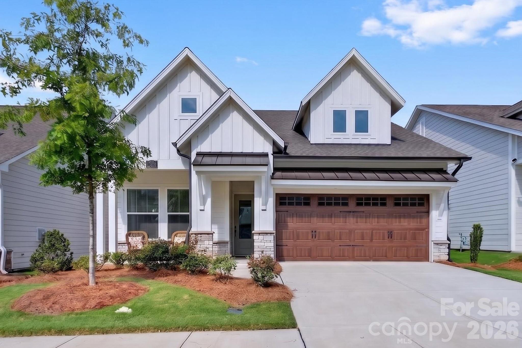 This beautiful 3 bedroom home is a truly remarkable living space, especially for those looking to enjoy a newer 55+ community lifestyle in their new abode. The upgrades and improvements that the current owners have made the covered porch into a three-season room and enhanced  the closet with custom shelving, certainly add to the home's appeal and functionality. Additionally, the community’s amenities such as the pool, gym, and pickleball courts suggest an active and social environment, which is significant for many future residents. Also, there's Tesla charging plug in the garage. It's wonderful to hear that Encore at Streamside was recognized as the #1 new community in the Charlotte area, as this type of accolade can further enhance the property's attractiveness. This home offers convenient access to shopping and recreational activities. With its contemporary design, high-quality finishes, and desirable features, this residence is truly a must-see.