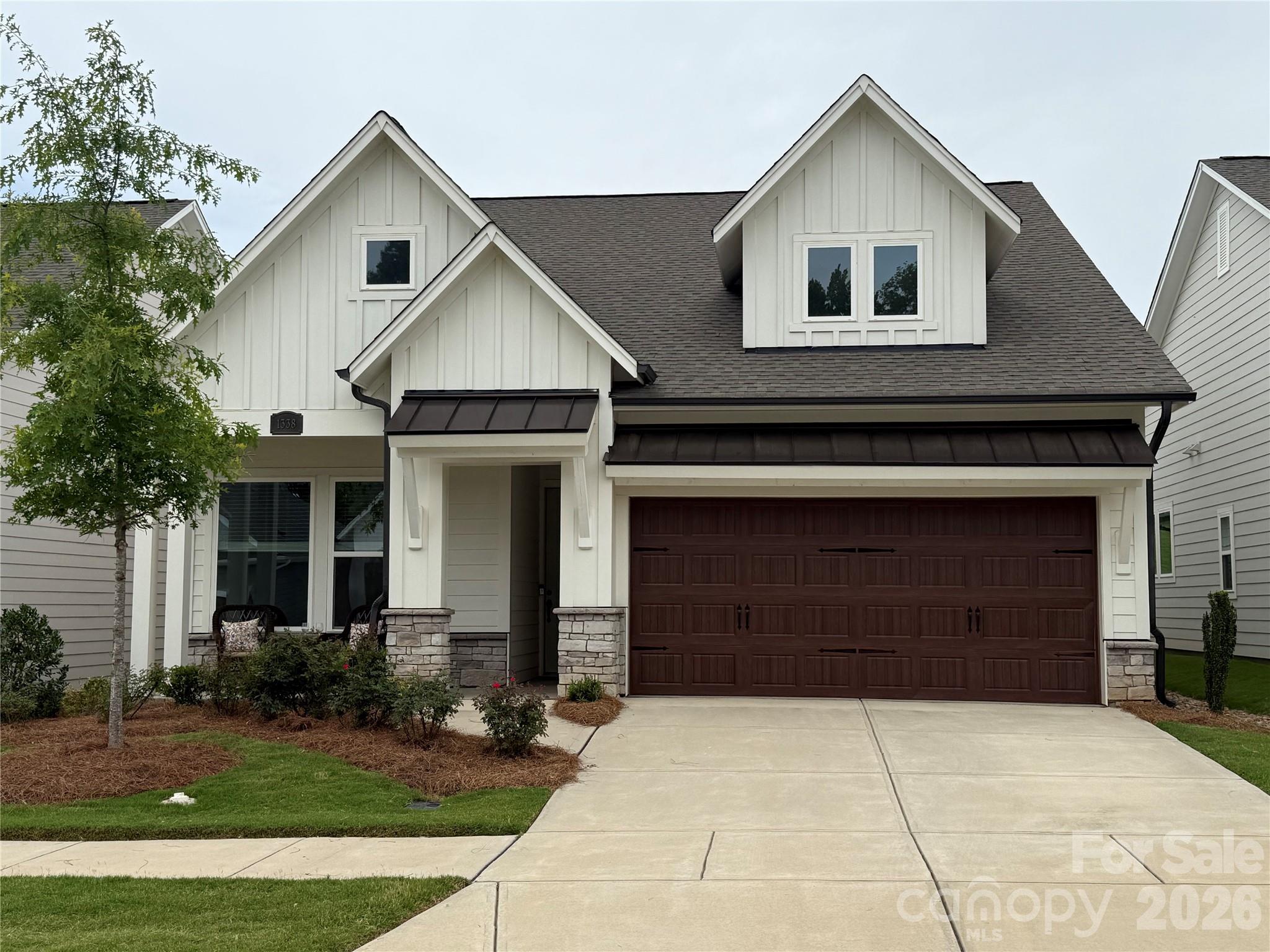 This beautiful 3 bedroom home is a truly remarkable living space, especially for those looking to enjoy a newer 55+ community lifestyle in their new abode. The upgrades and improvements that the current owners have made the covered porch into a three-season room and enhanced  the closet with custom shelving, certainly add to the home's appeal and functionality. Additionally, the community’s amenities such as the pool, gym, and pickleball courts suggest an active and social environment, which is significant for many future residents. Also, there's Tesla charging plug in the garage. It's wonderful to hear that Encore at Streamside was recognized as the #1 new community in the Charlotte area, as this type of accolade can further enhance the property's attractiveness. This home offers convenient access to shopping and recreational activities. With its contemporary design, high-quality finishes, and desirable features, this residence is truly a must-see.