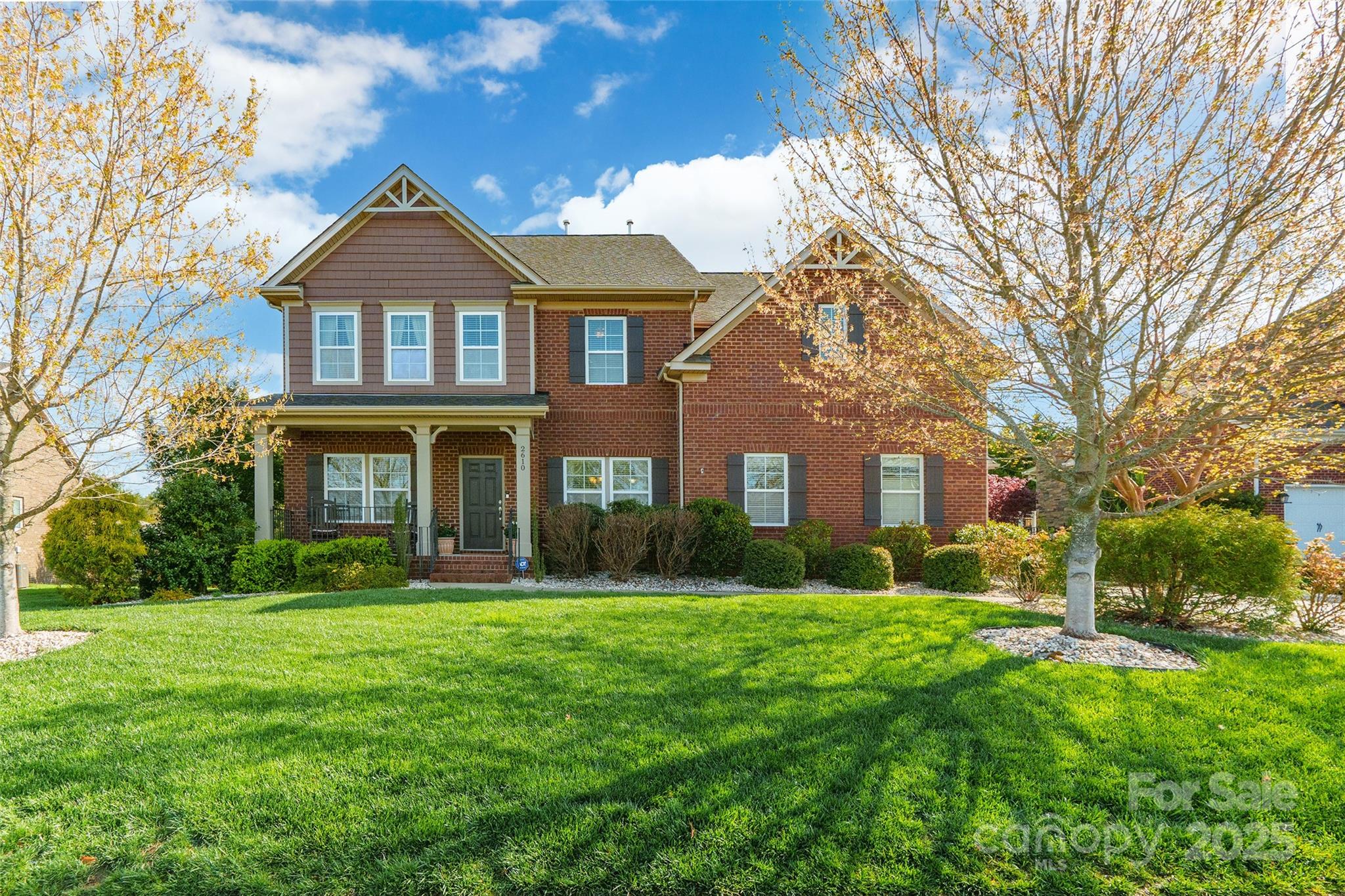 This meticulously maintained stunner is tucked away in the exclusive River Lake community in the highly sought after Ft Mill School District with lake access next door at Nivens Creek Landing. The 5 bedroom, 3 full bath home was thoughtfully designed with comfort and style in mind. No expense was spared to feature ceiling fans in nearly every room, large bedrooms with extra windows added for beautiful natural light, each bathroom upgraded with tile showers, custom built-ins in the living room, gorgeous hardwoods, under-cabinet lighting and extra outlets added throughout the house. Whole house is pre wired for surround sound and alarm system. The beautifully landscaped exterior features river rock accents and the lawn is meticulously maintained following the super sod protocol with a Rain Bird irrigation system on a separate meter for water savings, ensuring your lawn stays lush and green year-round. Deck has been recently refinished for added durability and beauty.