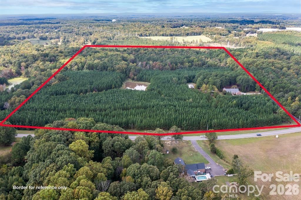 Exceptional Acreage in Prime Huntersville Location

A rare opportunity to own approximately 60 acres in a highly sought-after area of Huntersville, NC. This picturesque property features mature trees, multiple ponds, and over 1,000 feet of road frontage along Mt Holly-Huntersville Road—perfect for a private estate, equestrian retreat, or potential subdivision development.

An existing 1996-built home and additional storage buildings are included on the property. A second House located on one of the parcels as well. For development opportunities, please refer to the Town of Huntersville for zoning and planning guidance.

Don't miss this unique chance to invest in one of the fastest-growing areas in the region!
