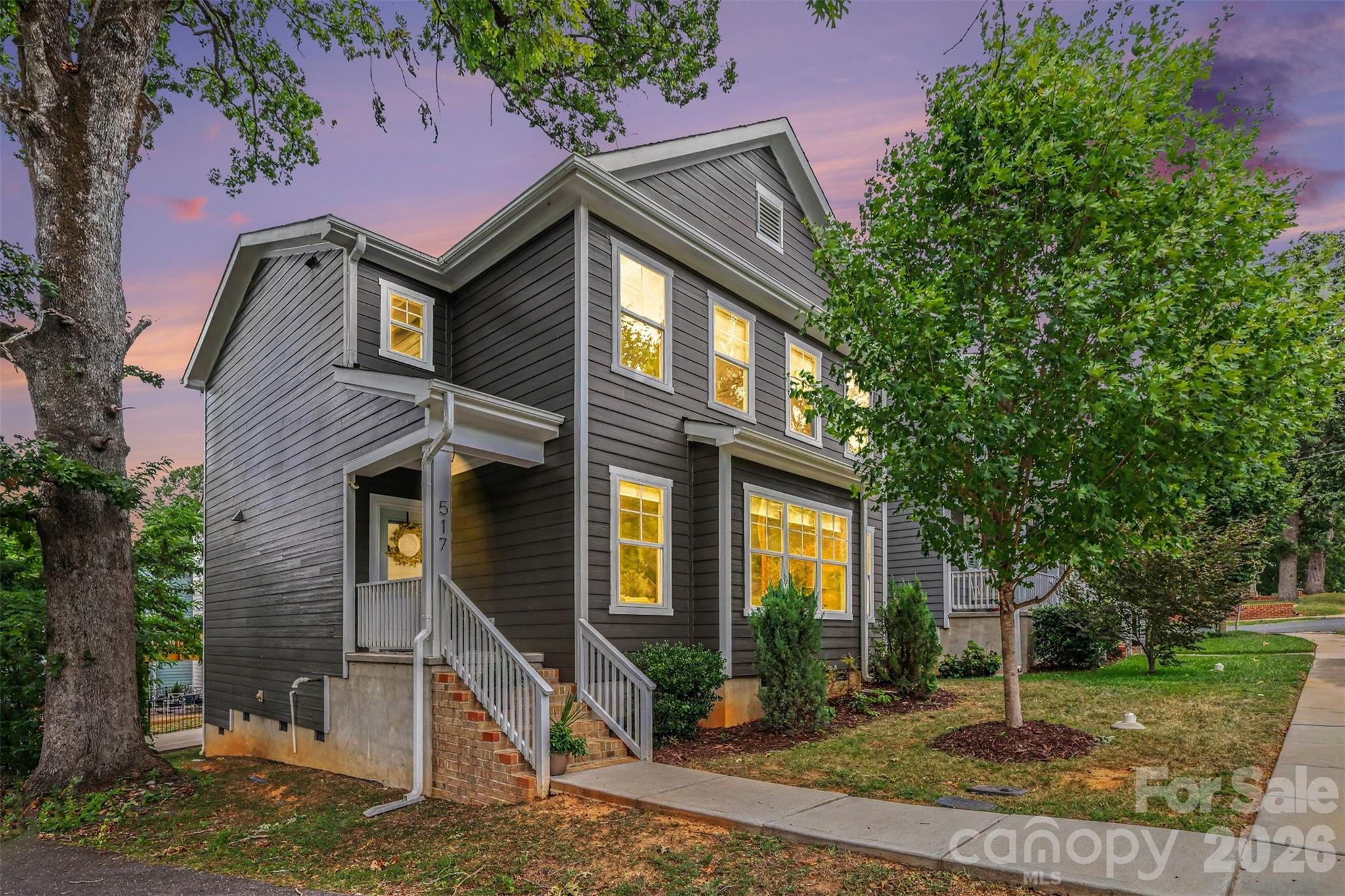 Experience the convenience and charm of historic downtown Waxhaw in this custom-built three-bedroom, two-and-one-half-bath residence just two blocks from Main Street. Enjoy an accessible lifestyle with locally owned restaurants, boutiques, coffee shops, bakeries, breweries and year-round community events nearby. Designed for modern living, the open-concept floor plan features 9-foot ceilings, luxury vinyl plank flooring and abundant natural light throughout the main living areas. The kitchen is equipped with granite countertops, stainless steel appliances including a gas range, vent hood and dishwasher, a spacious center island, a butler's pantry and an additional walk-in pantry. A flexible main-level space offers versatility for a home office, reading area or creative workspace. The second level includes a spacious primary suite with dual vanities, an oversized walk-in shower and a walk-in closet. Two additional bedrooms, a full bath and a convenient laundry room complete the upper level. Enjoy outdoor living on the private rear porch, an ideal place to relax after exploring downtown or entertaining guests. Operating as a successful short-term rental with a documented history of consistent year-round income potential, this property presents an exceptional opportunity as a primary residence, second home or investment property in one of Union County's desirable downtown locations.