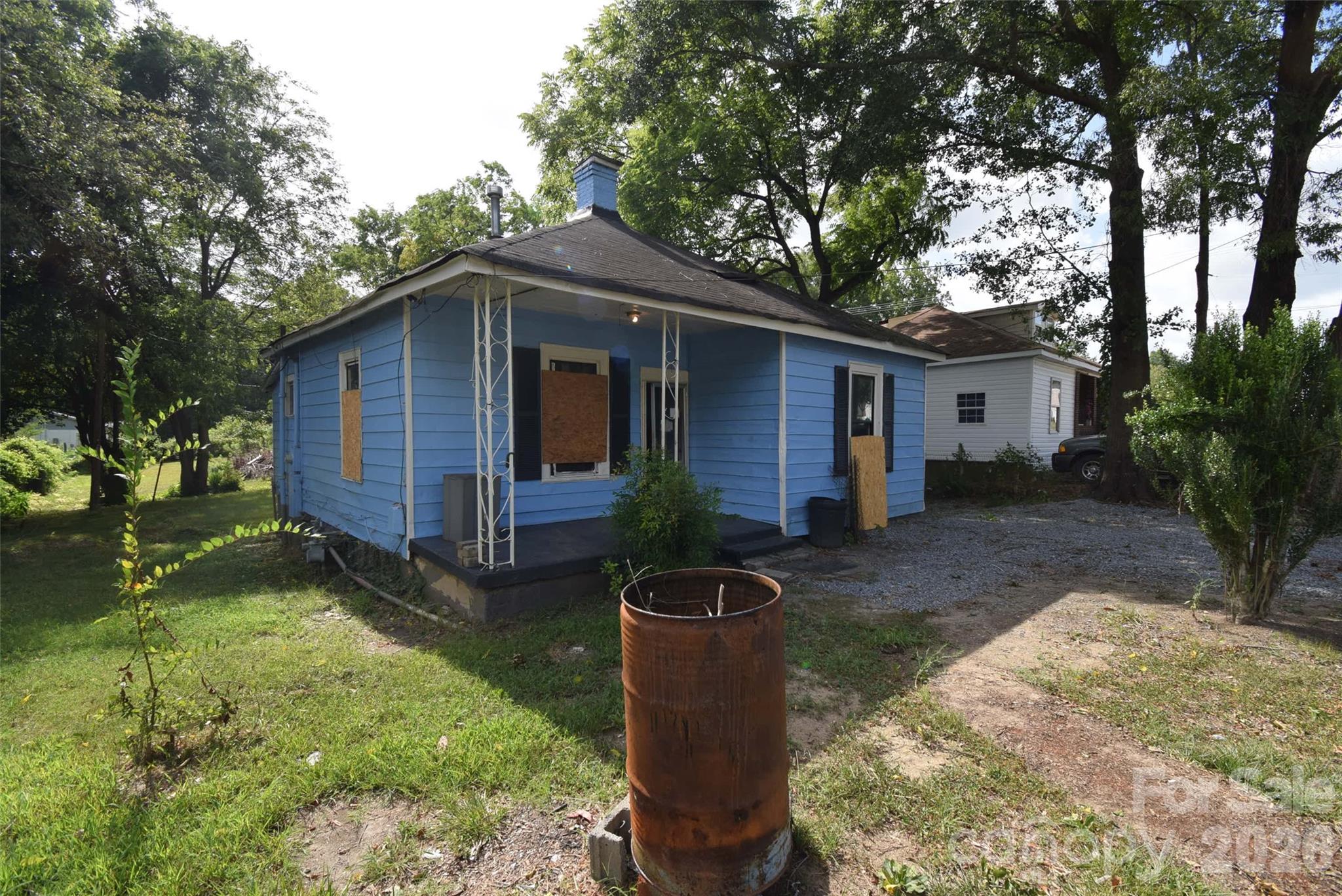 Calling all investors-- check this one out-- home needs total rehab. There are some renovated homes and also new homes on the street that have been built in the last few years. Home is on a private well in the front yard and a septic tank. Per the City of Gastonia, city water is available; sewer is not. See info in the media section. The 2nd bedroom does not have a closet, but there is a room next to it where a nice closet could be built.  The home will not qualify for FHA or VA type financing and is a cash, conventional renovation loan or hard money loan property. Easy to show. Any personal property left on the property at closing will convey