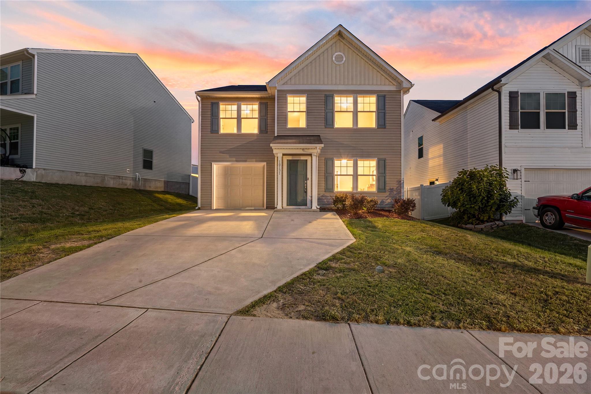 Fantastic opportunity to be in the coveted Upper Riverpoint neighborhood just minutes from Mt Island Lake! This home offers 4 bedrooms and 2.5 bathrooms with a spacious and versatile floor plan; perfect for the modern buyer. The main level features a bright and open layout highlighted by the living room, dining area and kitchen complete with ample cabinetry and counterspace, matching appliance and an island with bar seating! The main level is completed by two additional and private rooms which make for a perfect office, den,  sitting area, or hobby space! Upstairs, the spacious primary suite features an oversized walk-in closet and private ensuite bath, while three additional bedrooms provide additional living space or can be used for flex space if needed! A full bath, and convenient upper-level laundry complete the second floor and provide for easy and convenient living. Enjoy outdoor relaxation on the patio and the convenience of a attached garage with additional driveway parking. Built with modern efficiency and low-maintenance living in mind, this home is located in a sidewalk-lined community close to shopping, dining, and easy access to CLT airport and White Water Center!
